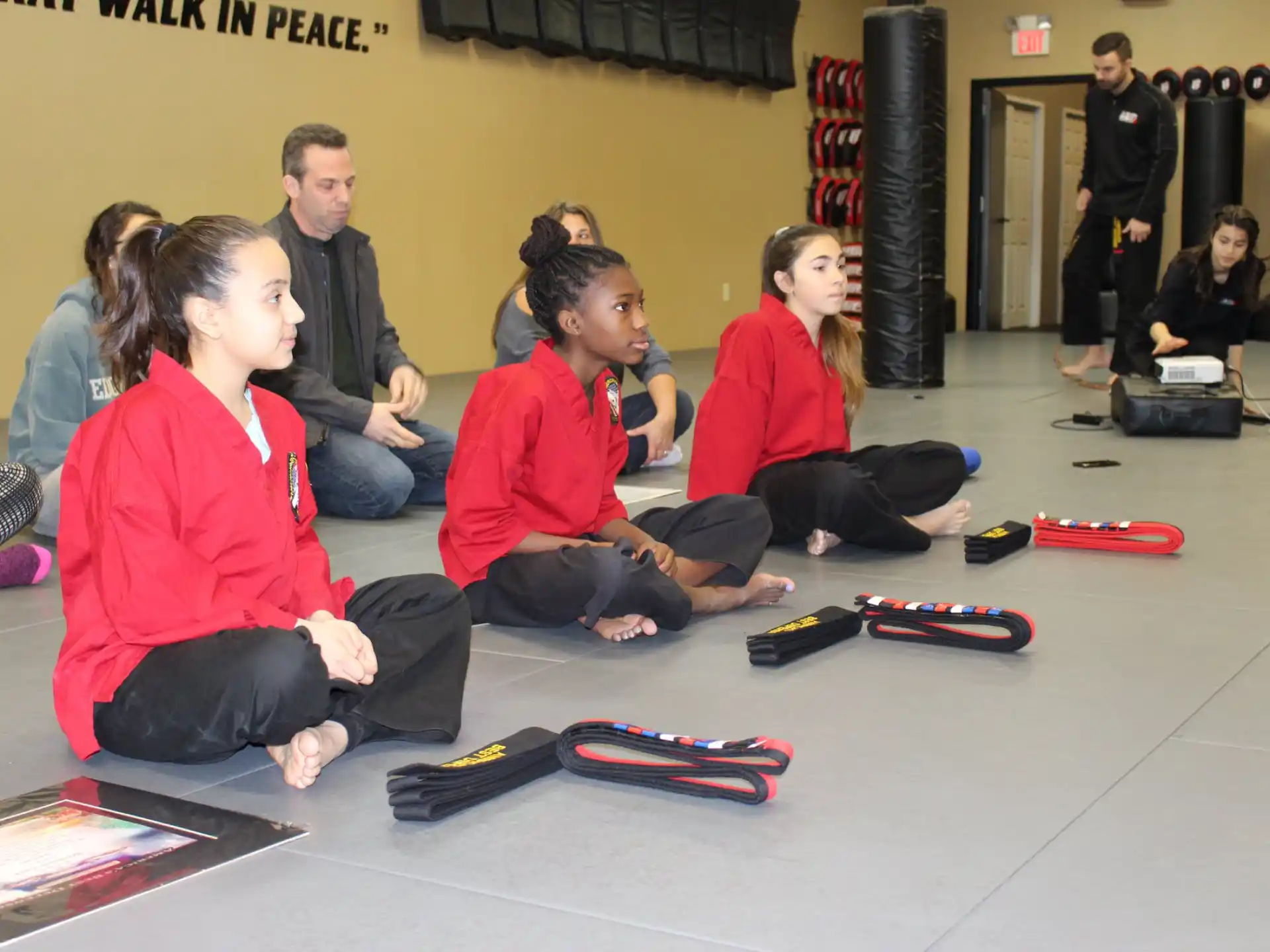 a group of people sitting on the floor