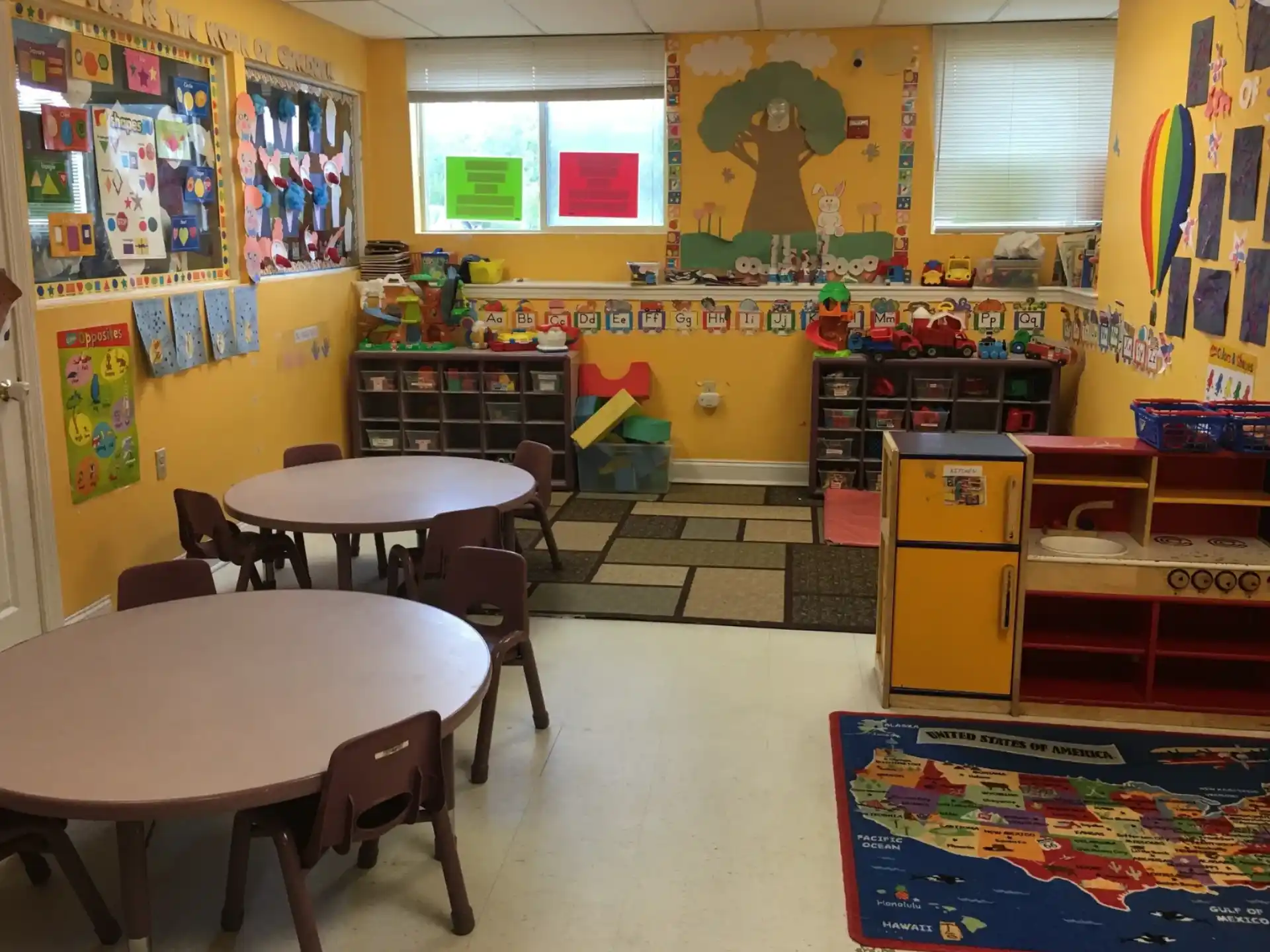 a room with tables and chairs