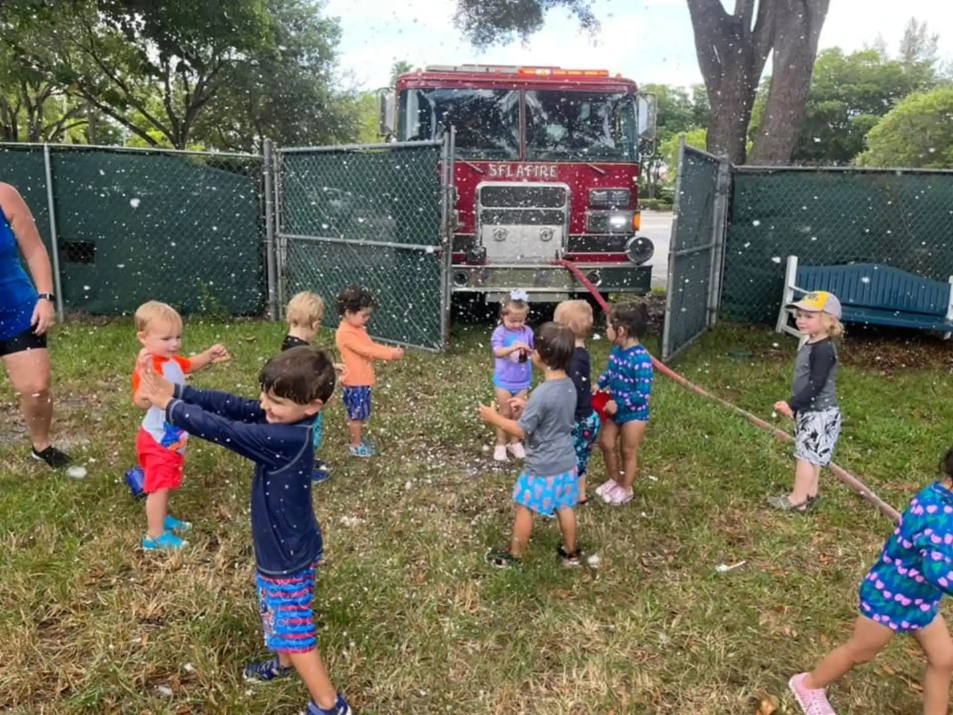 a group of children playing in a yard