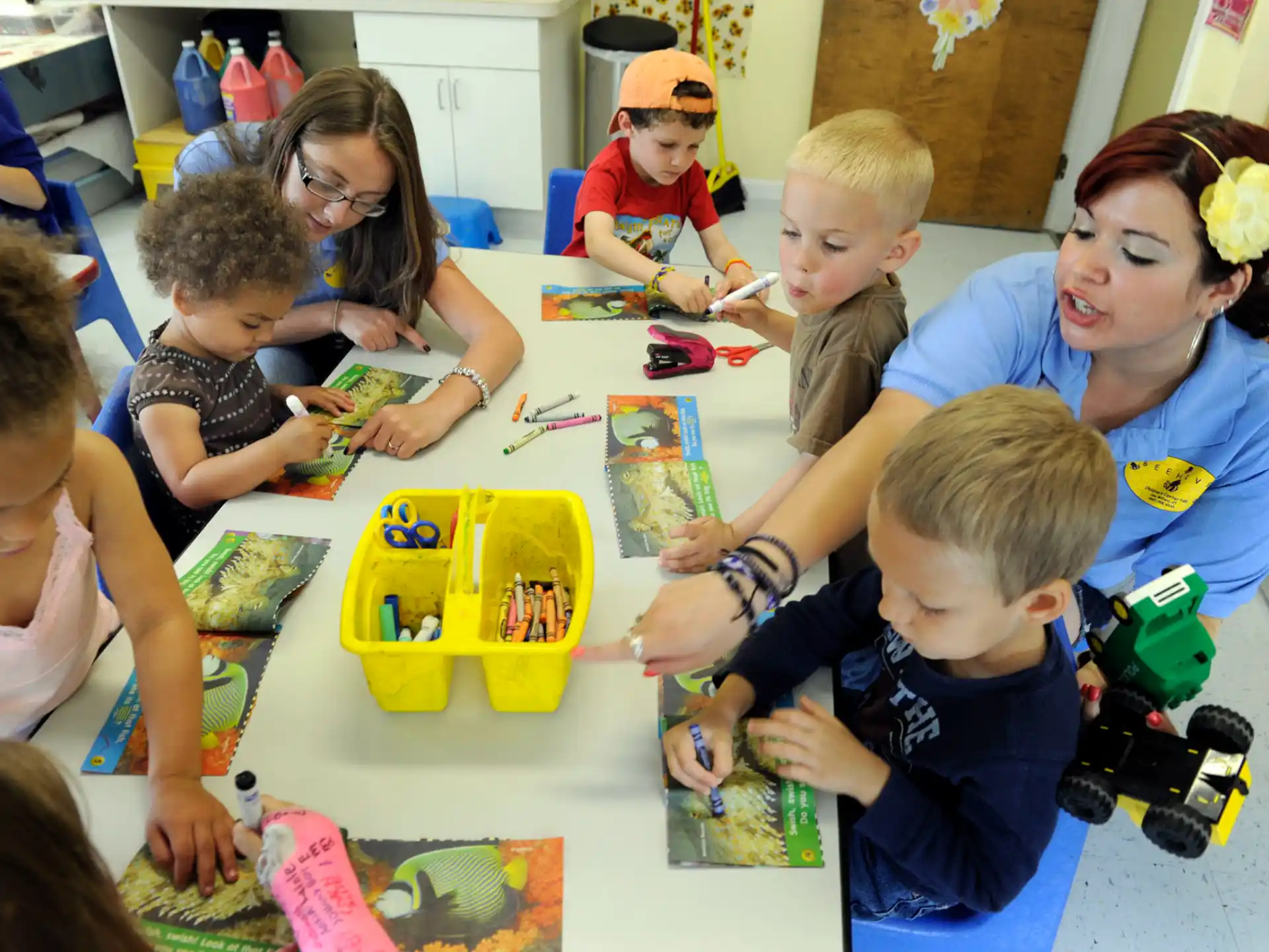 a group of children playing with toys