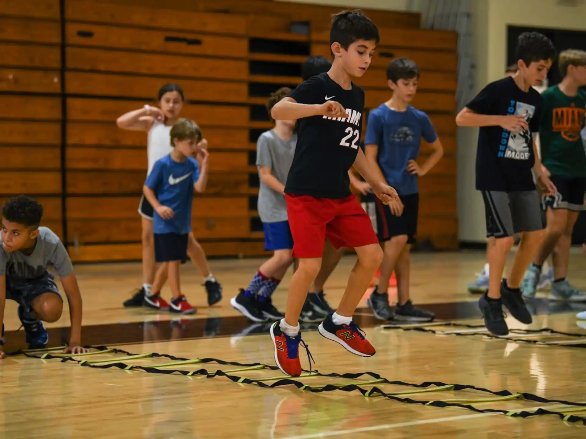 a group of boys playing basketball
