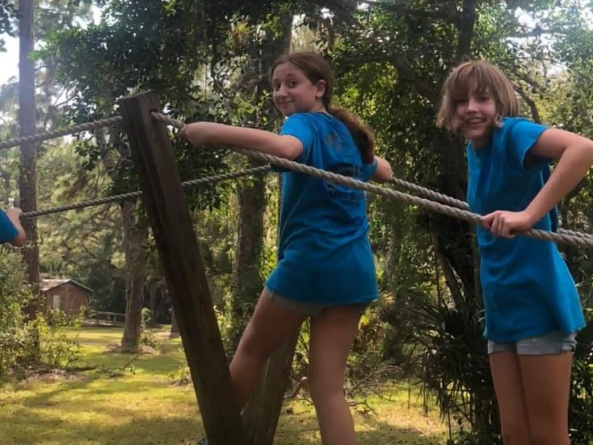 a group of girls in blue shirts