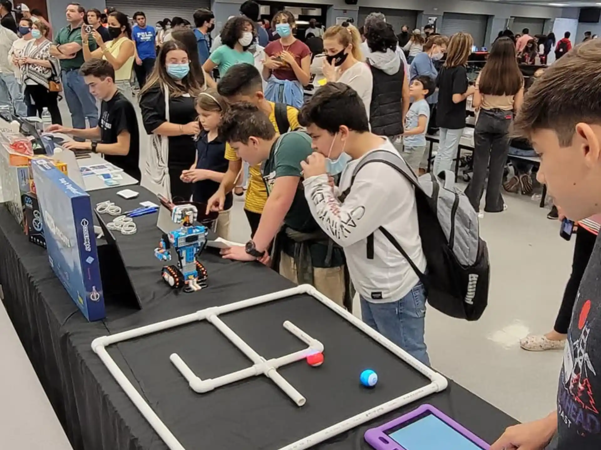 a group of people at a convention