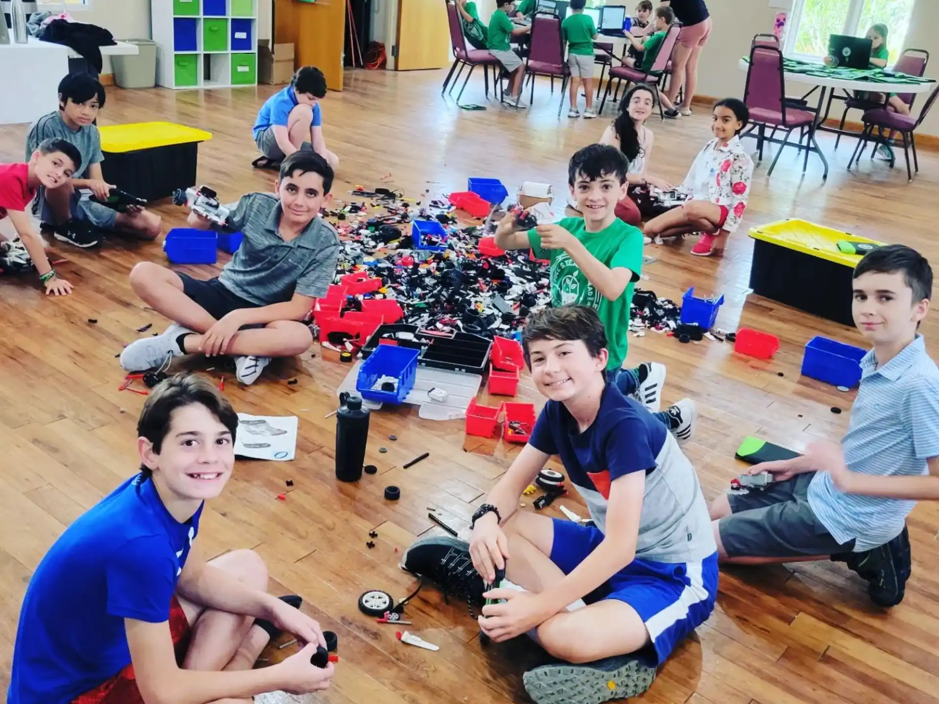 a group of people sitting on the floor