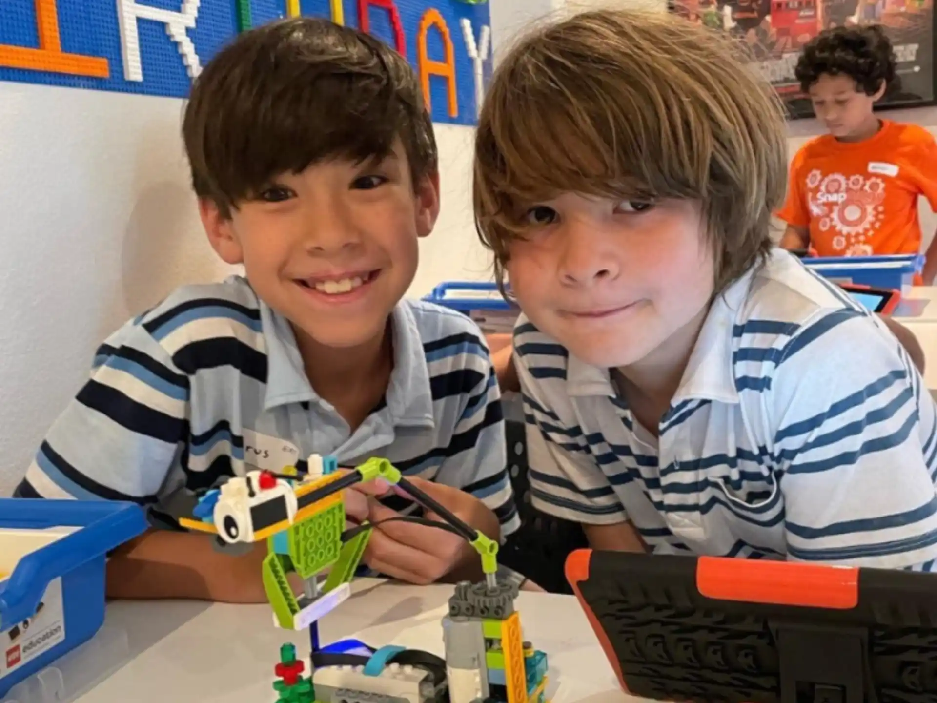 a couple of boys playing with toys
