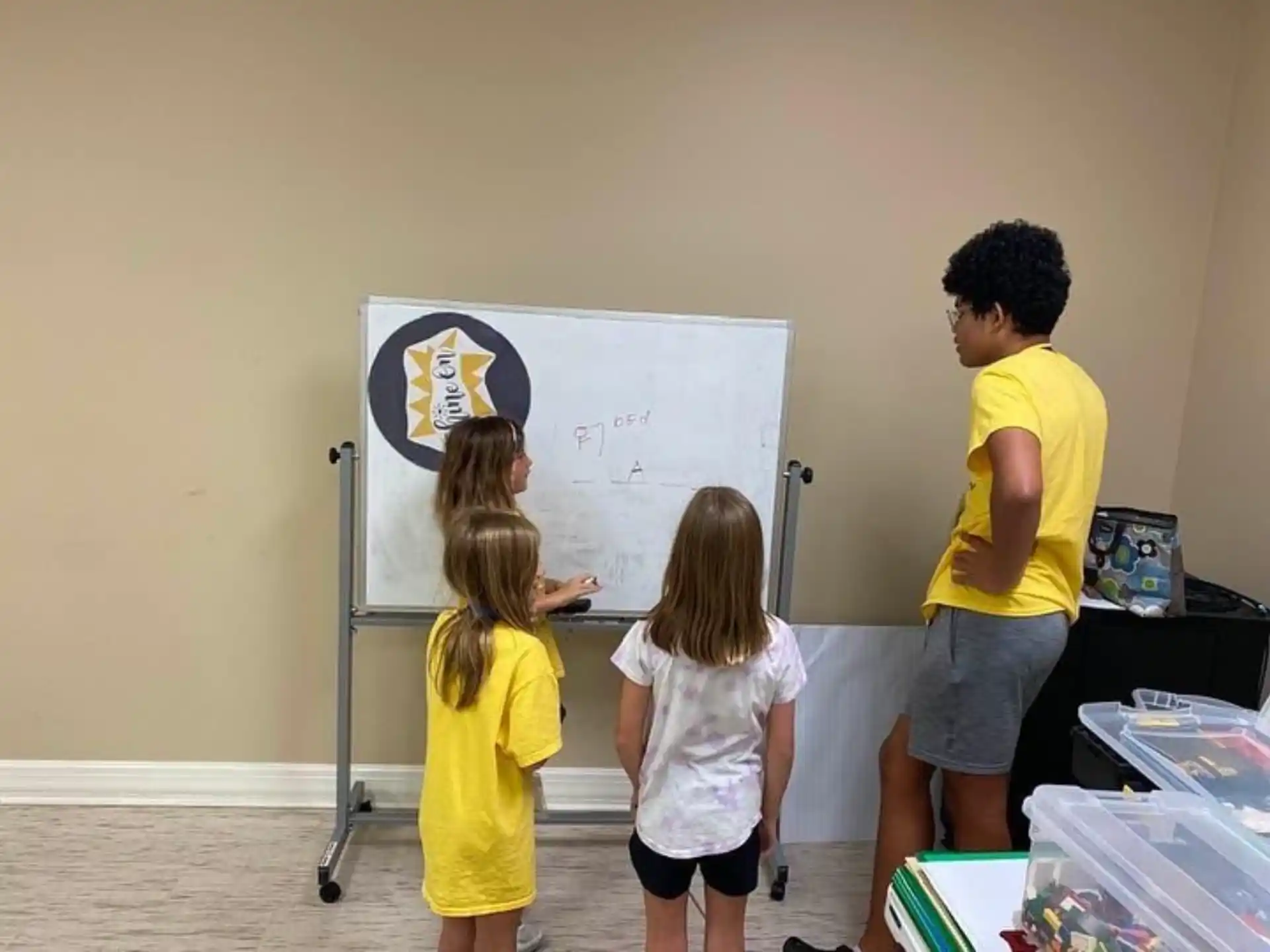 a group of children in a classroom