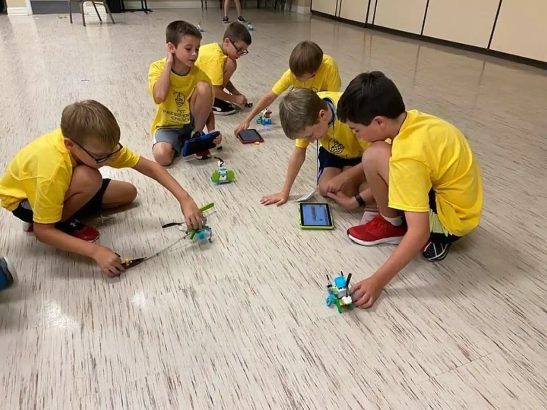 a group of kids playing with toys