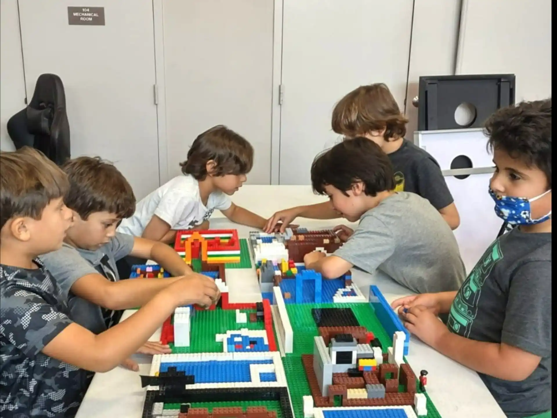 a group of children playing a board game