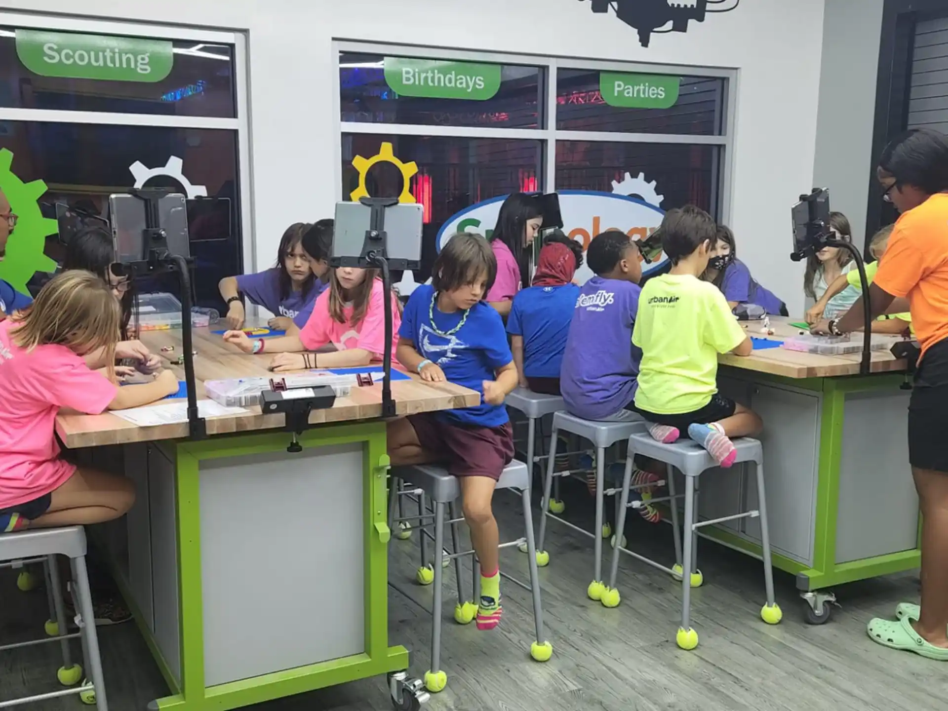 a group of people sitting at tables
