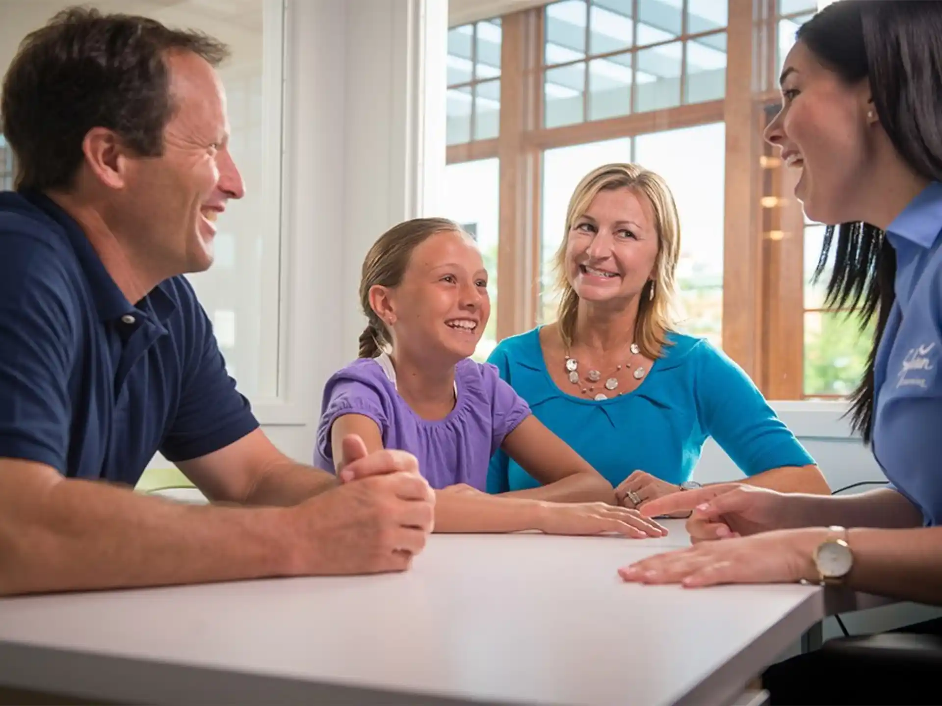 a group of people sitting at a table