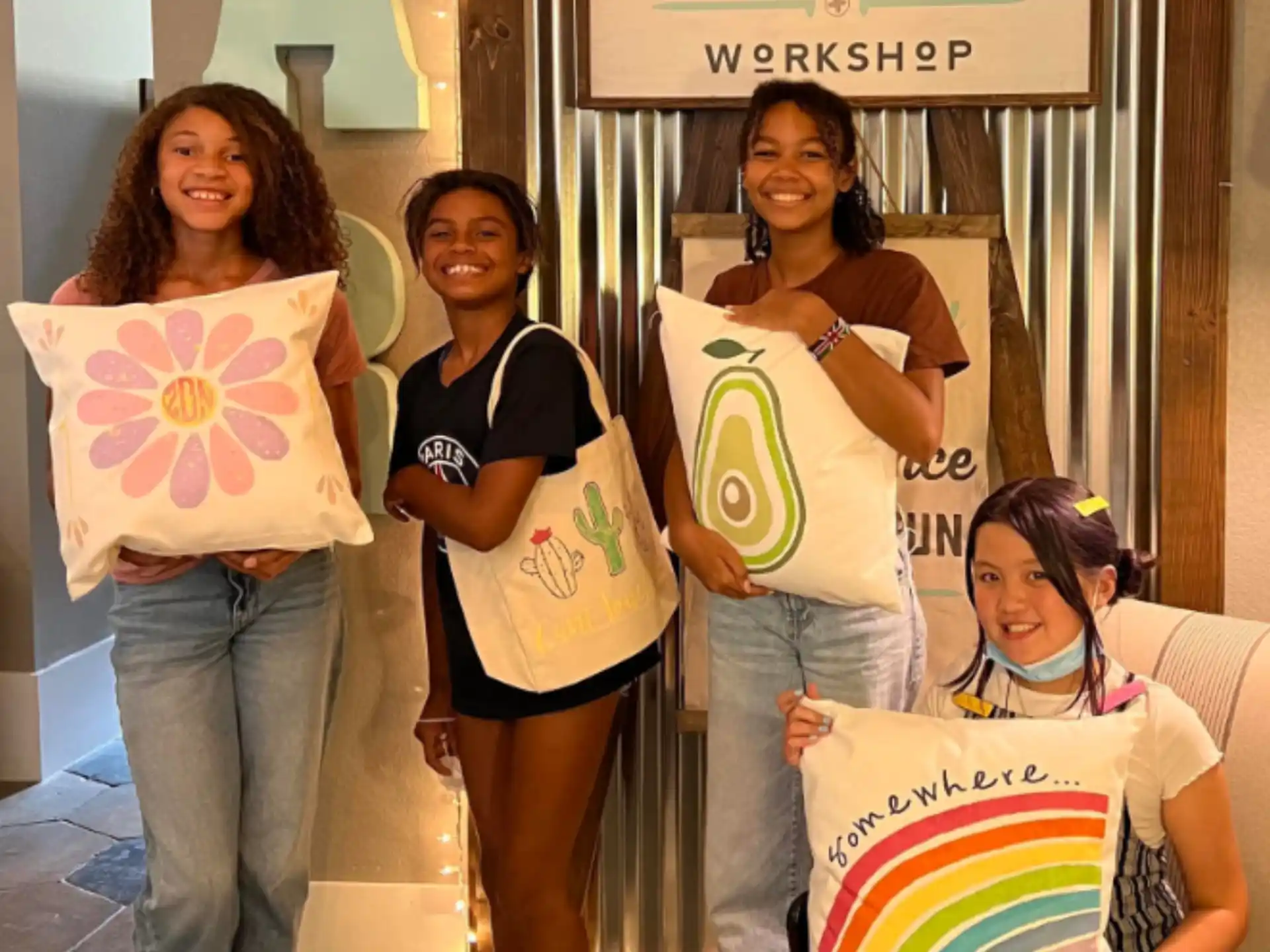 a group of women holding signs