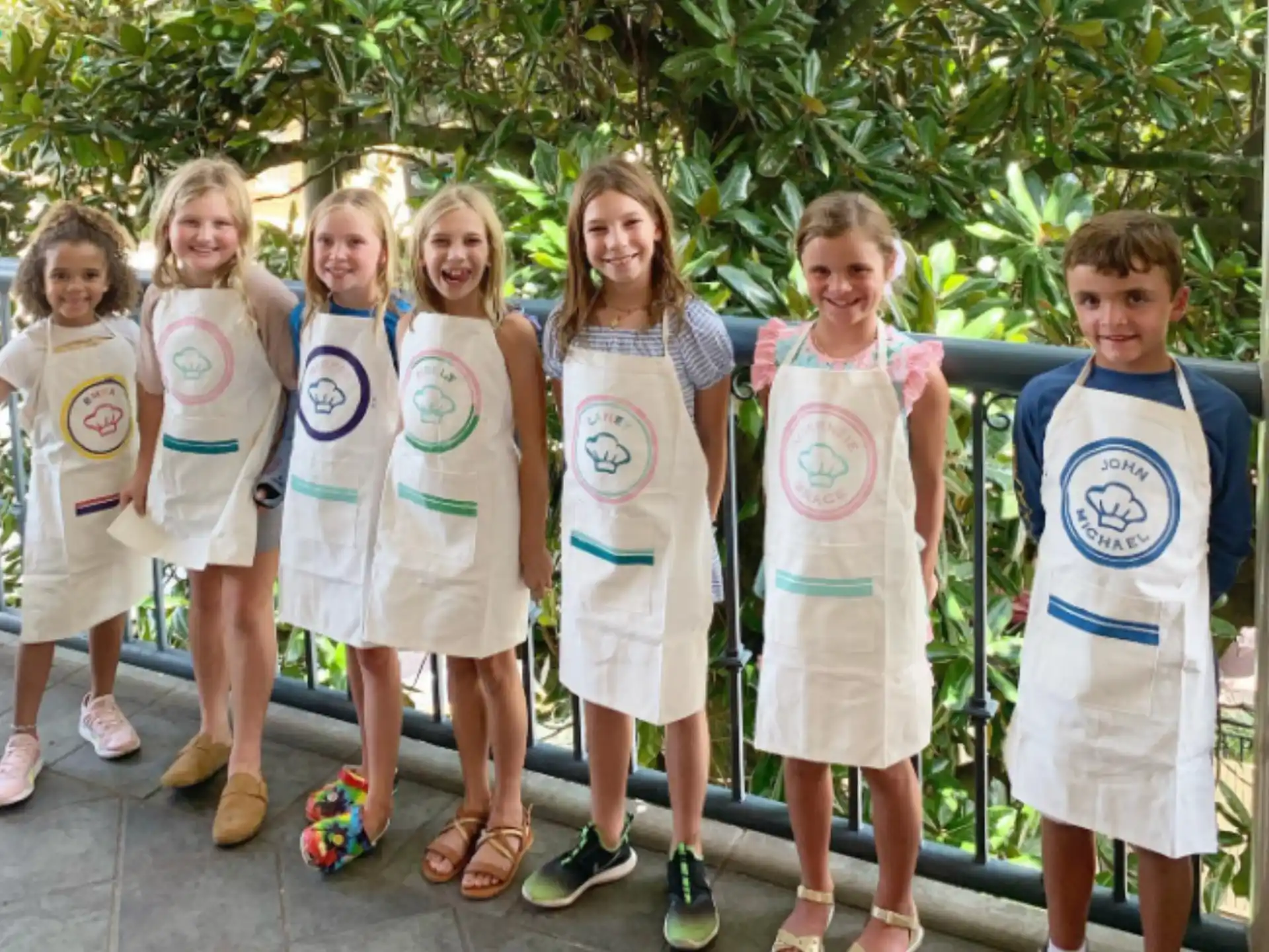 a group of children wearing matching outfits