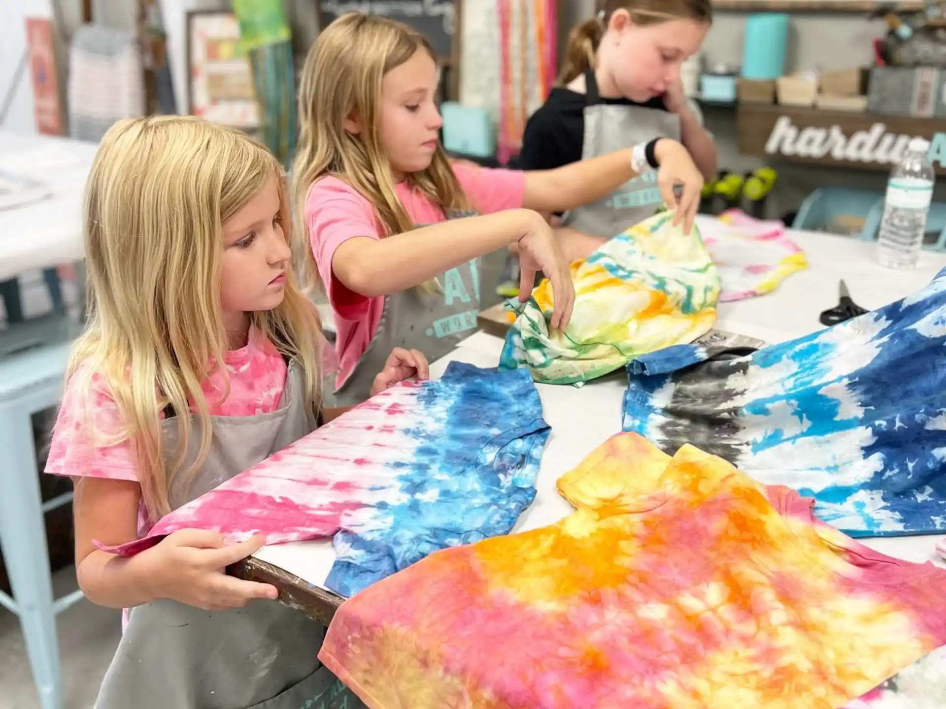 a group of girls painting