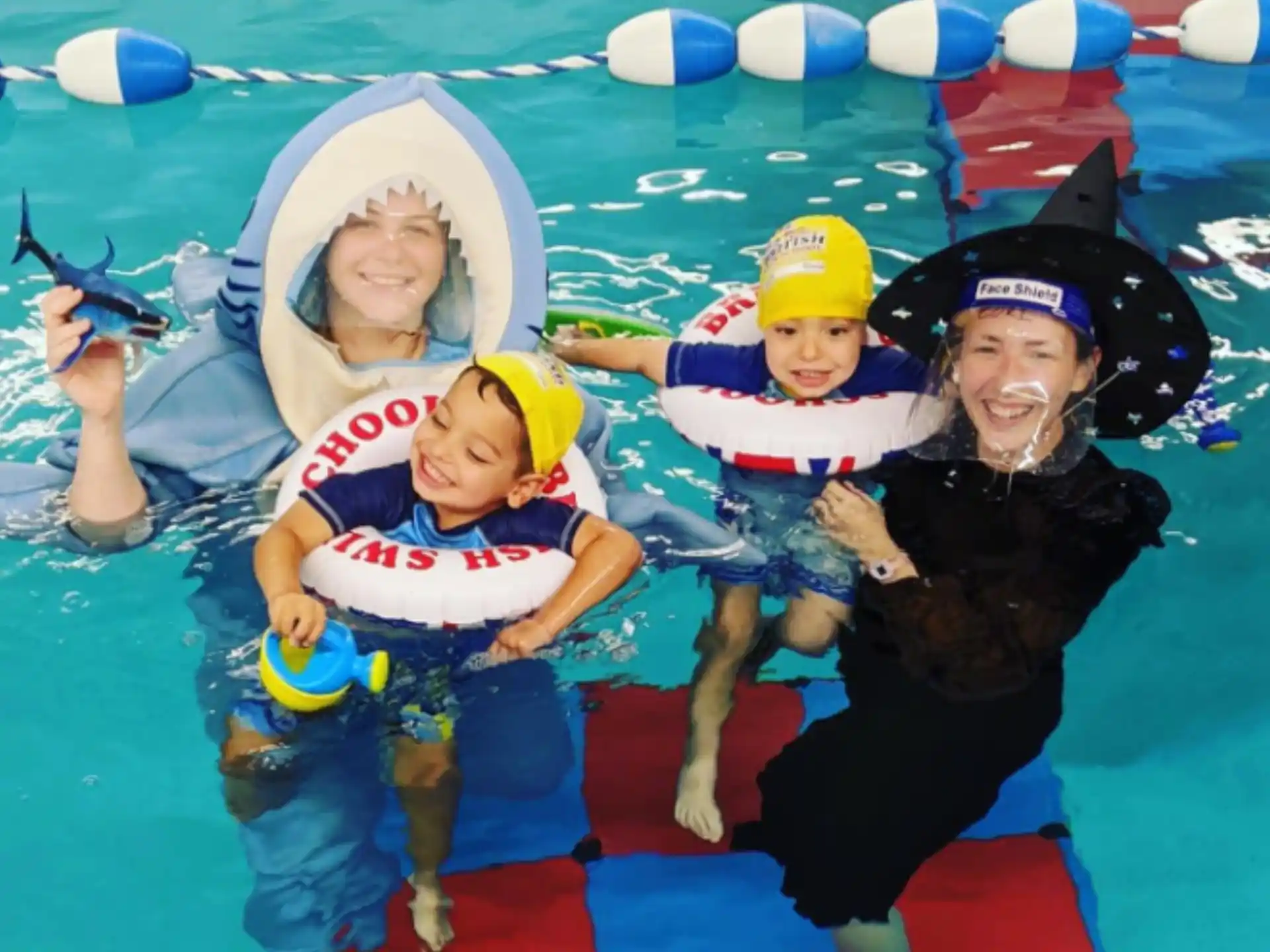 a group of people in a pool