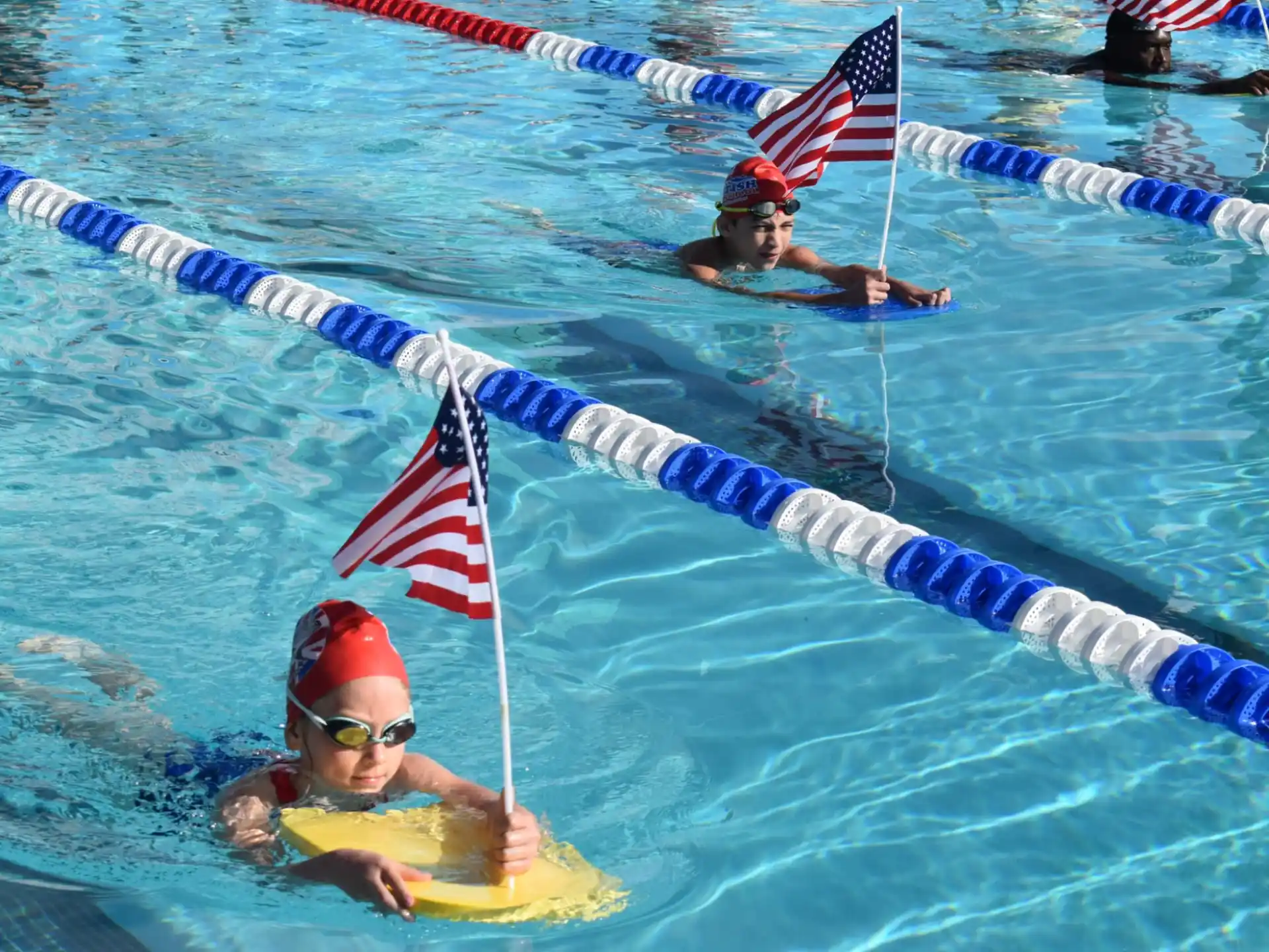 a group of people in a pool