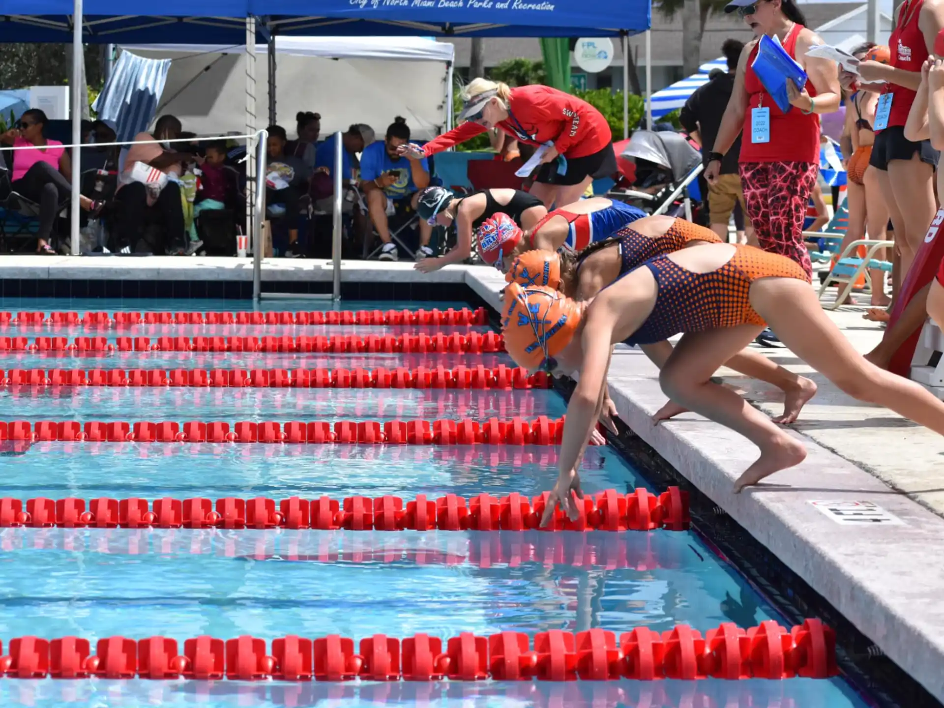a group of women in a swimming pool
