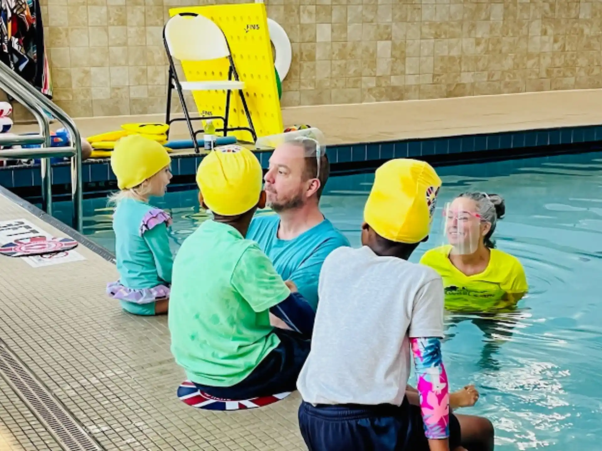 a group of people in a pool
