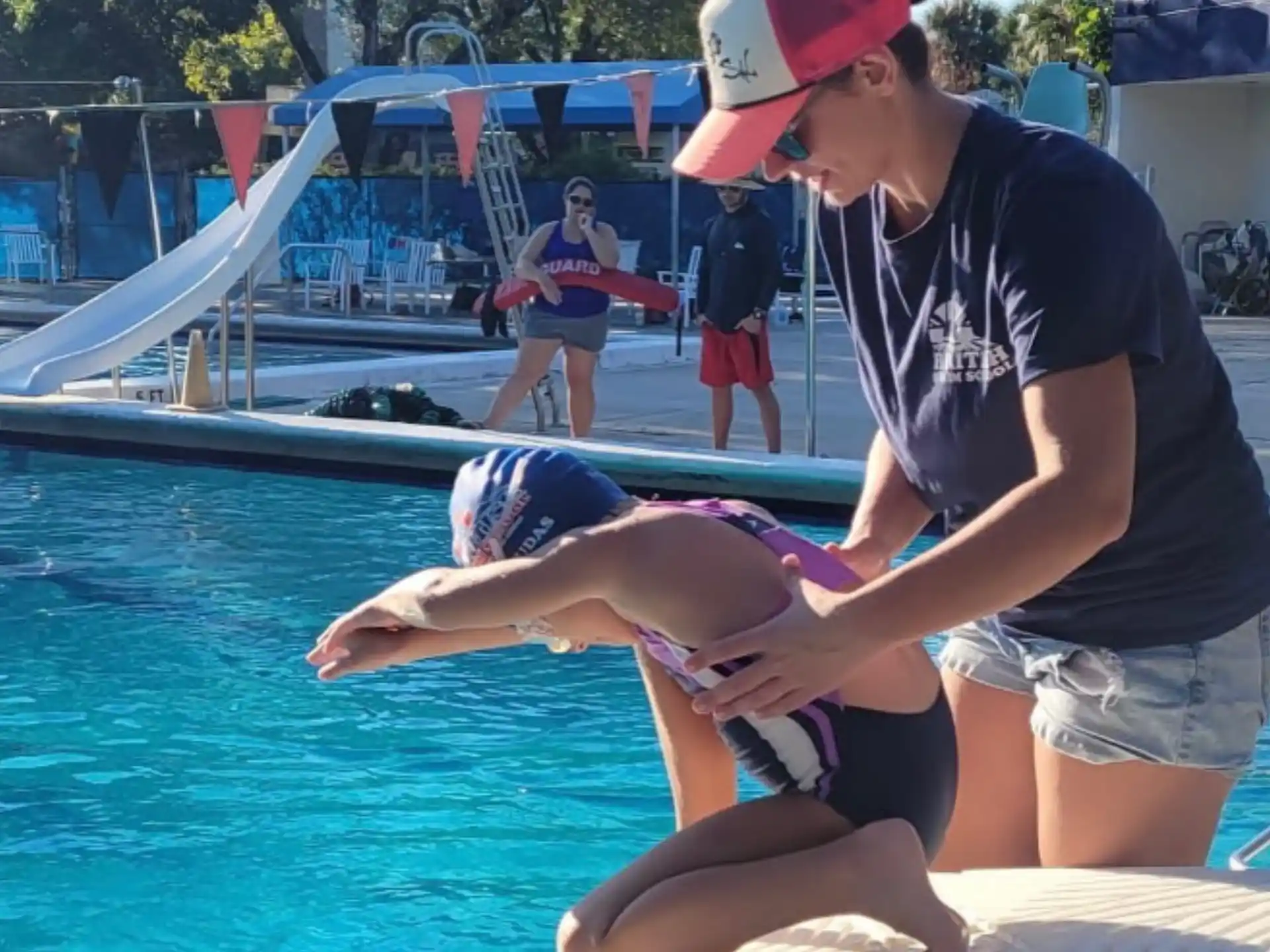 a man and a woman in a pool