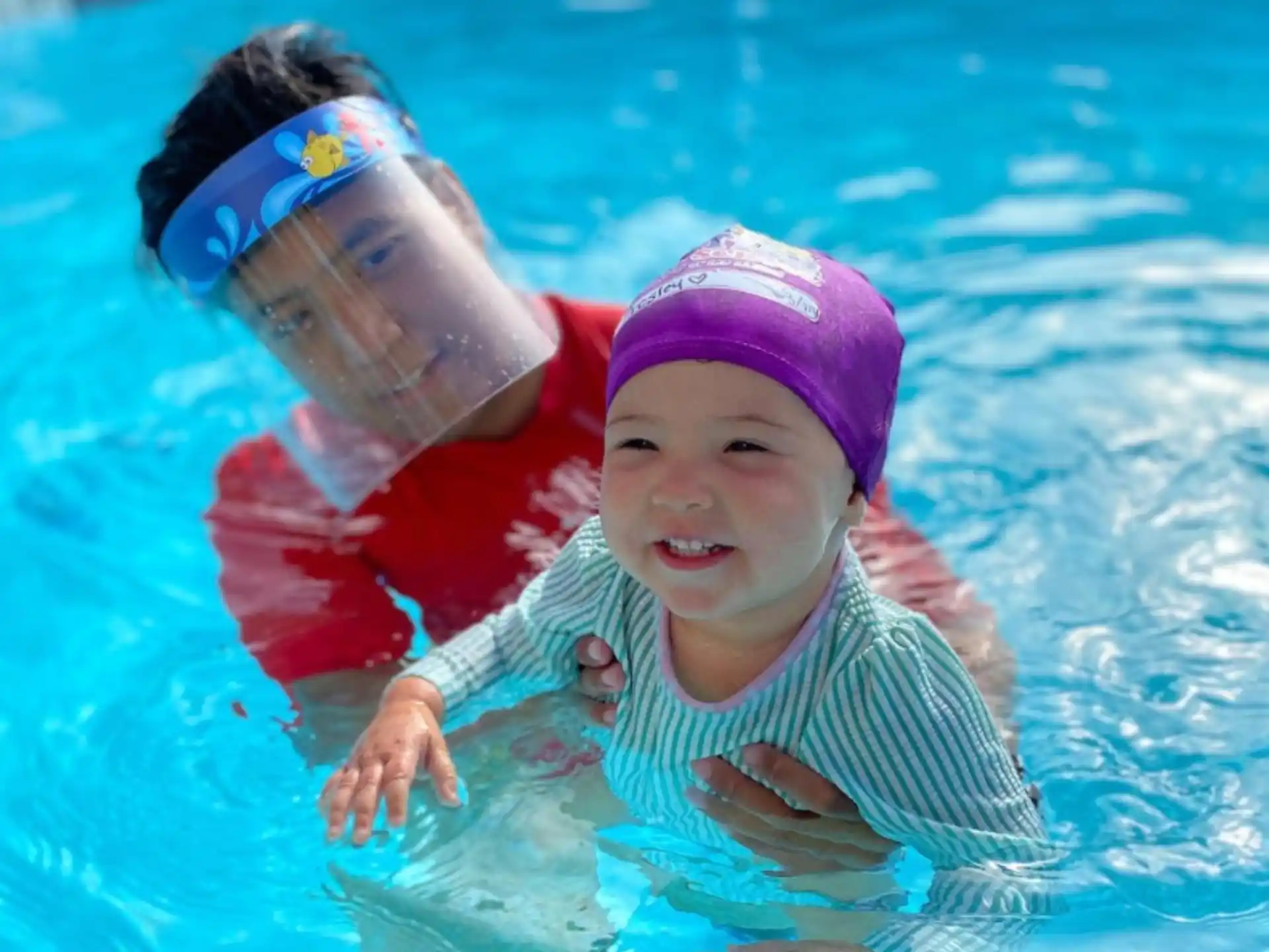 a baby in a pool