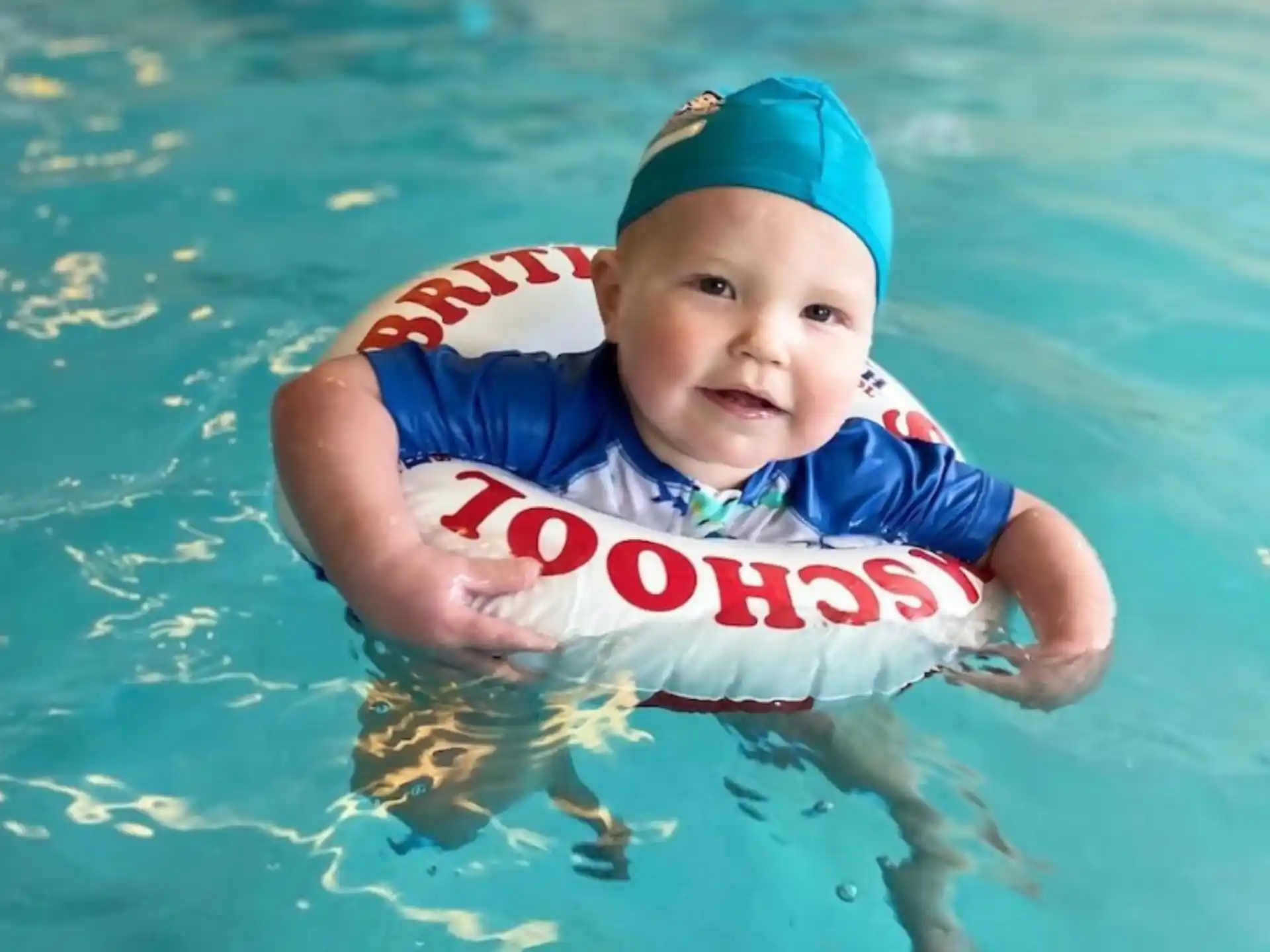 a boy in a pool