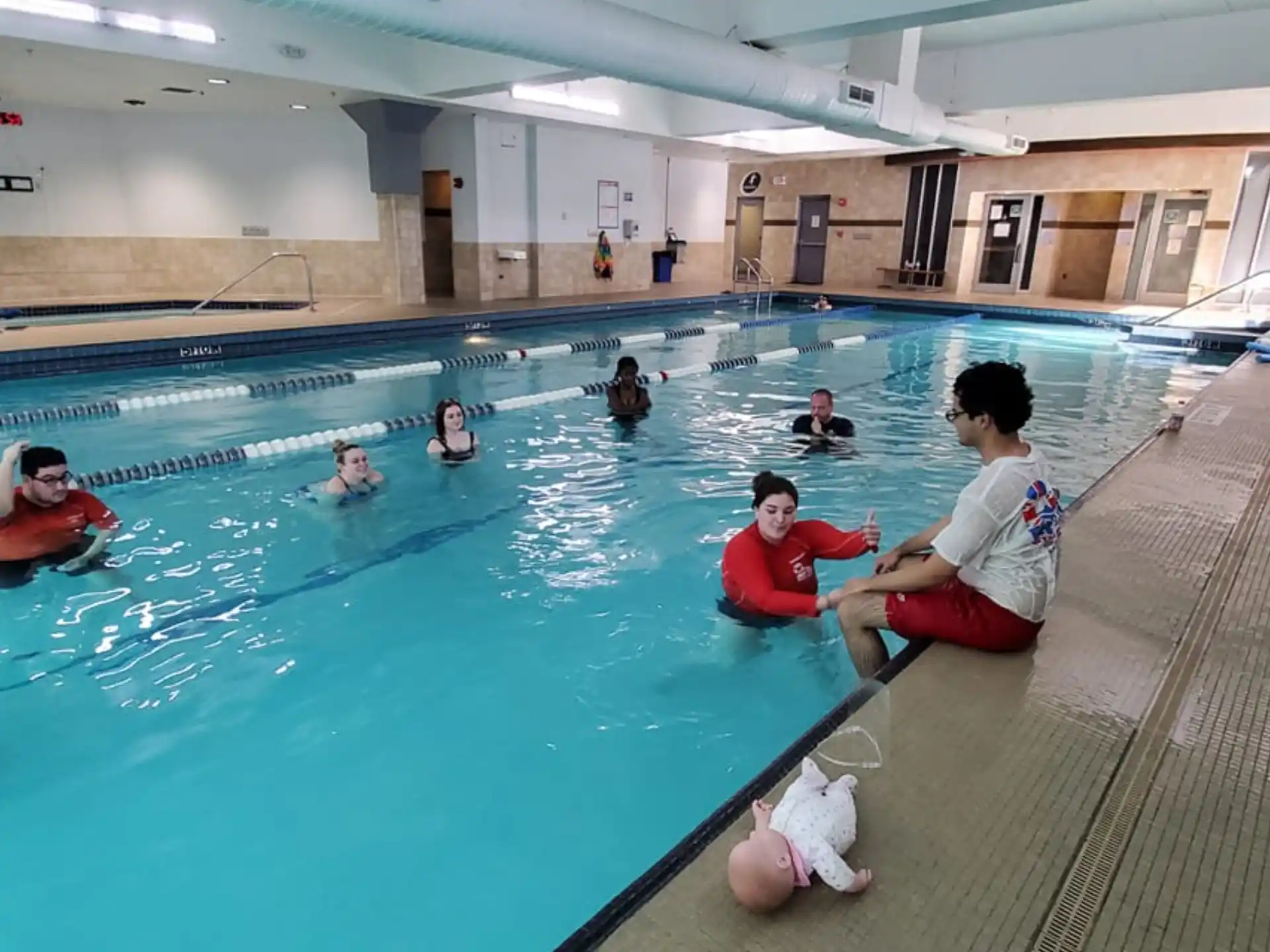 a group of people in a swimming pool
