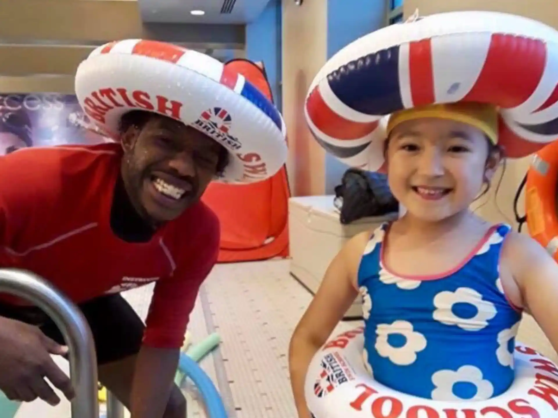 a person and a child wearing hats