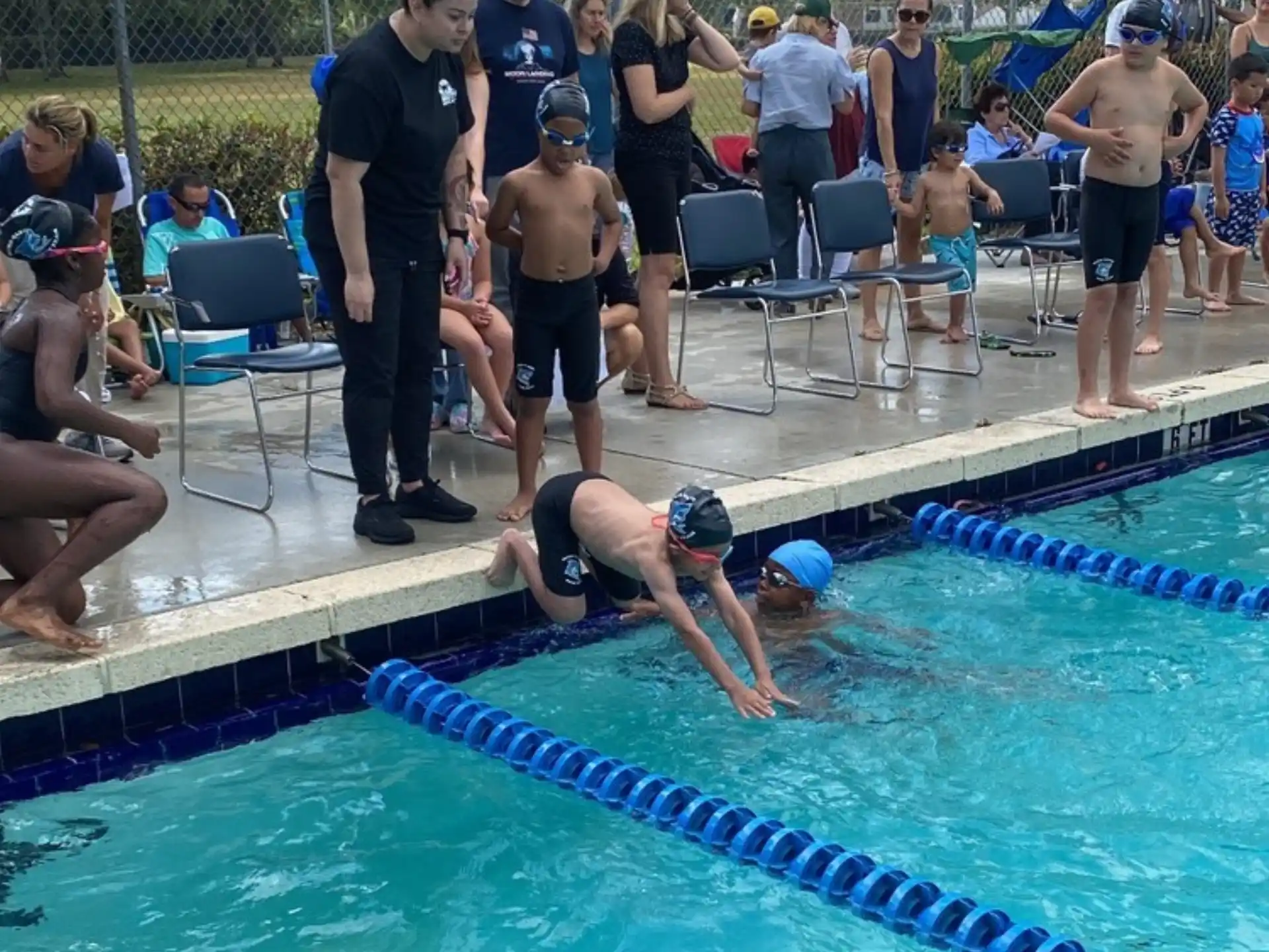 a group of people in a pool
