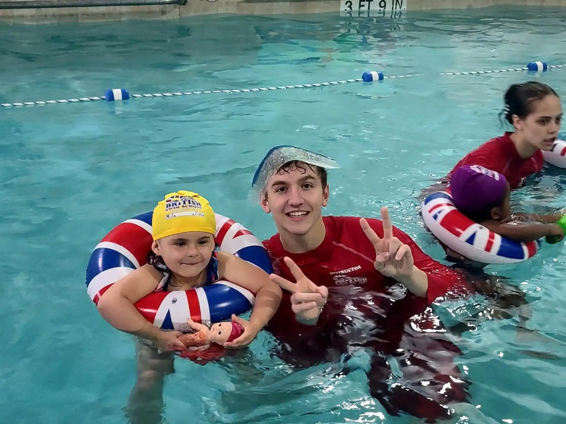 a group of people in a pool