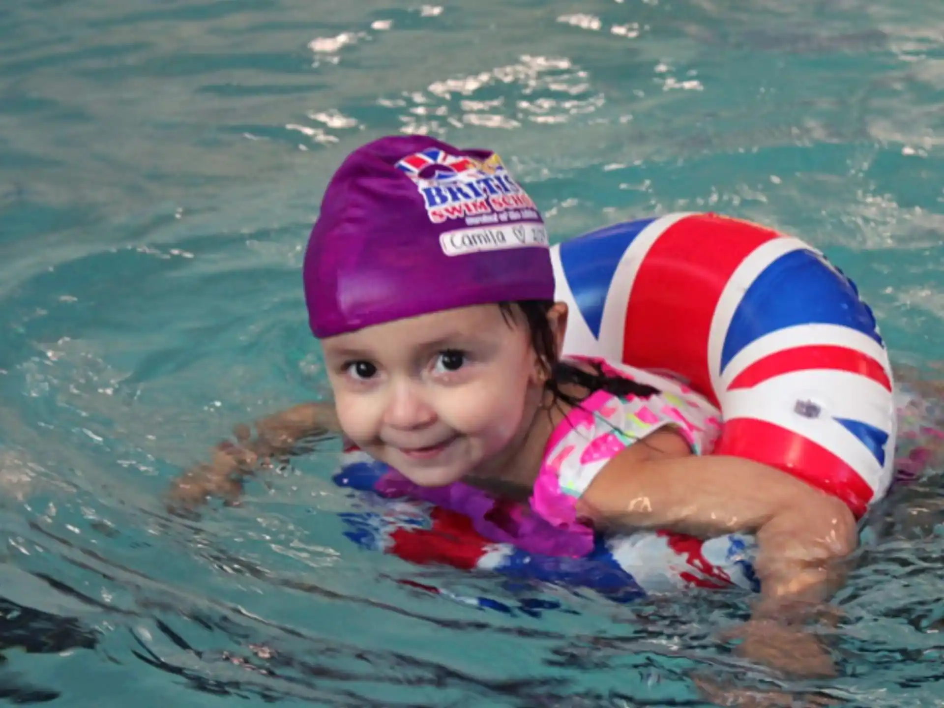 a child in a pool