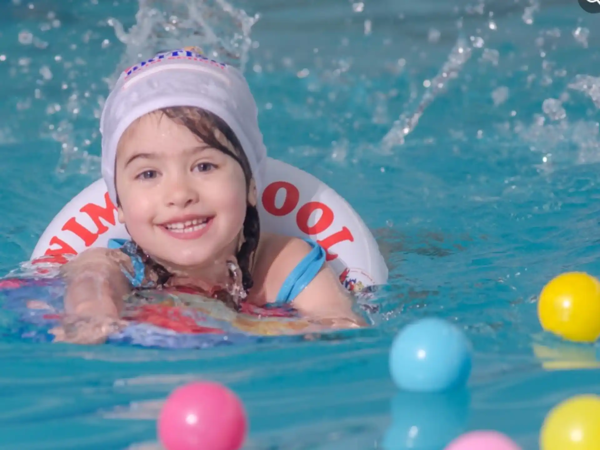 a girl in a pool