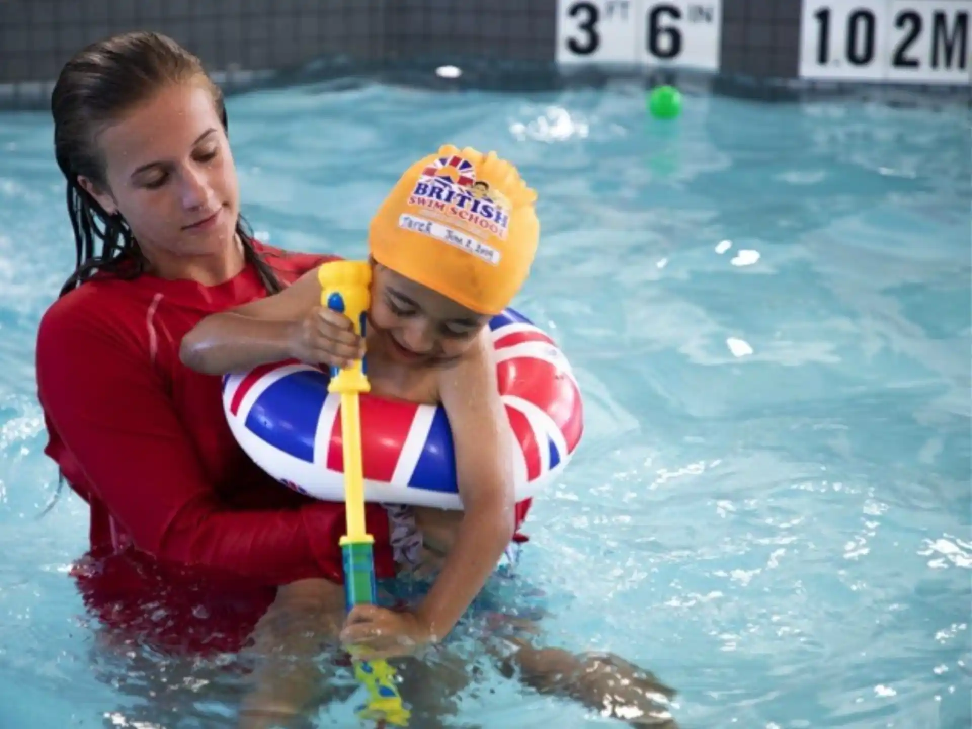 a man and woman in a pool