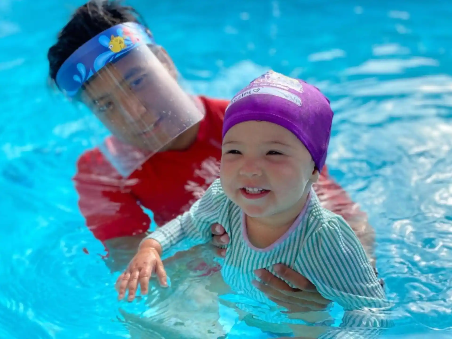 a child in a pool