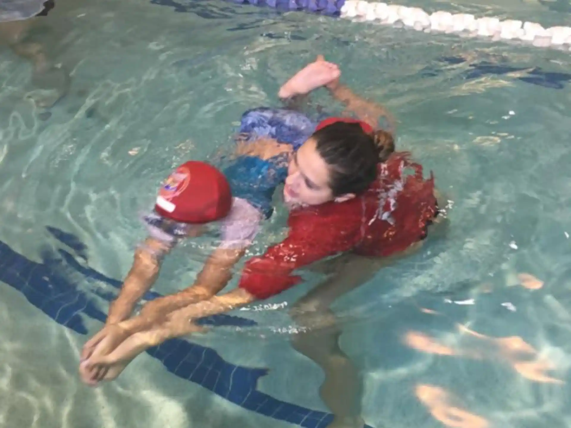 a couple of women in a pool