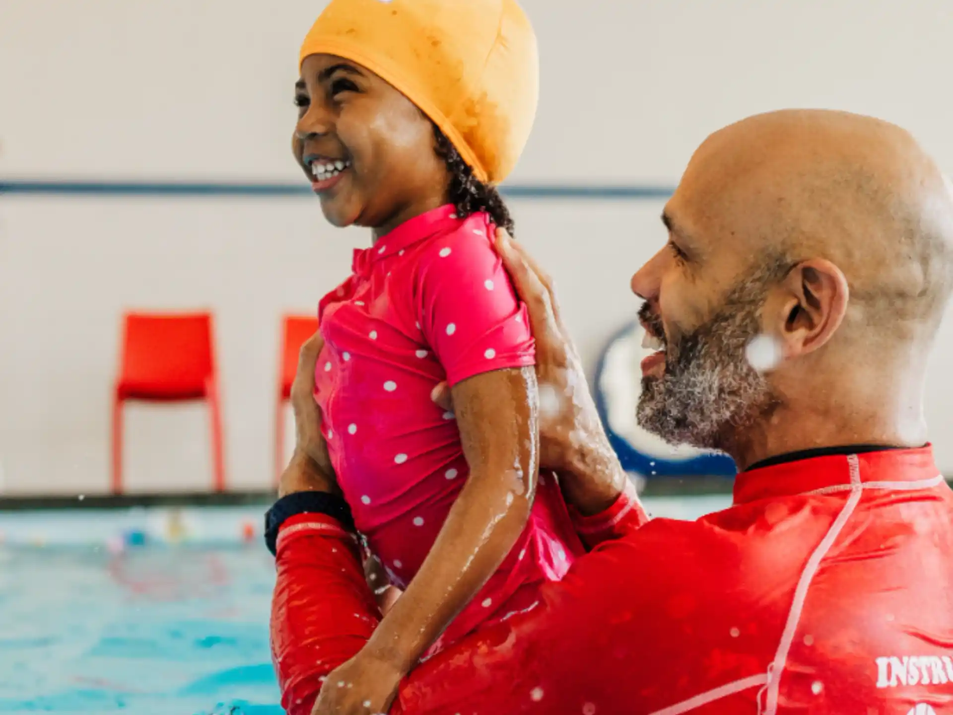 a man and a woman in a pool