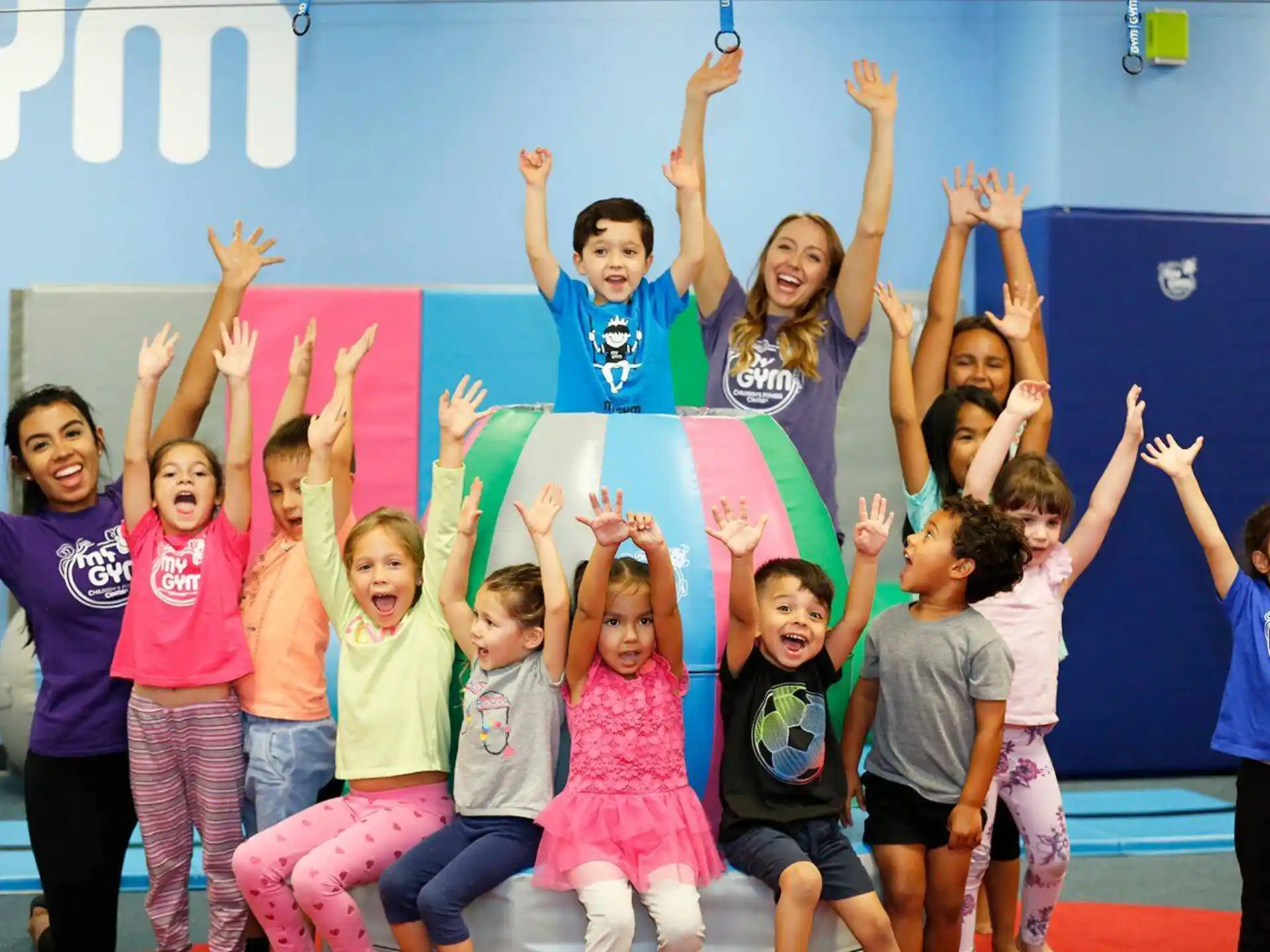 a group of children posing for a photo