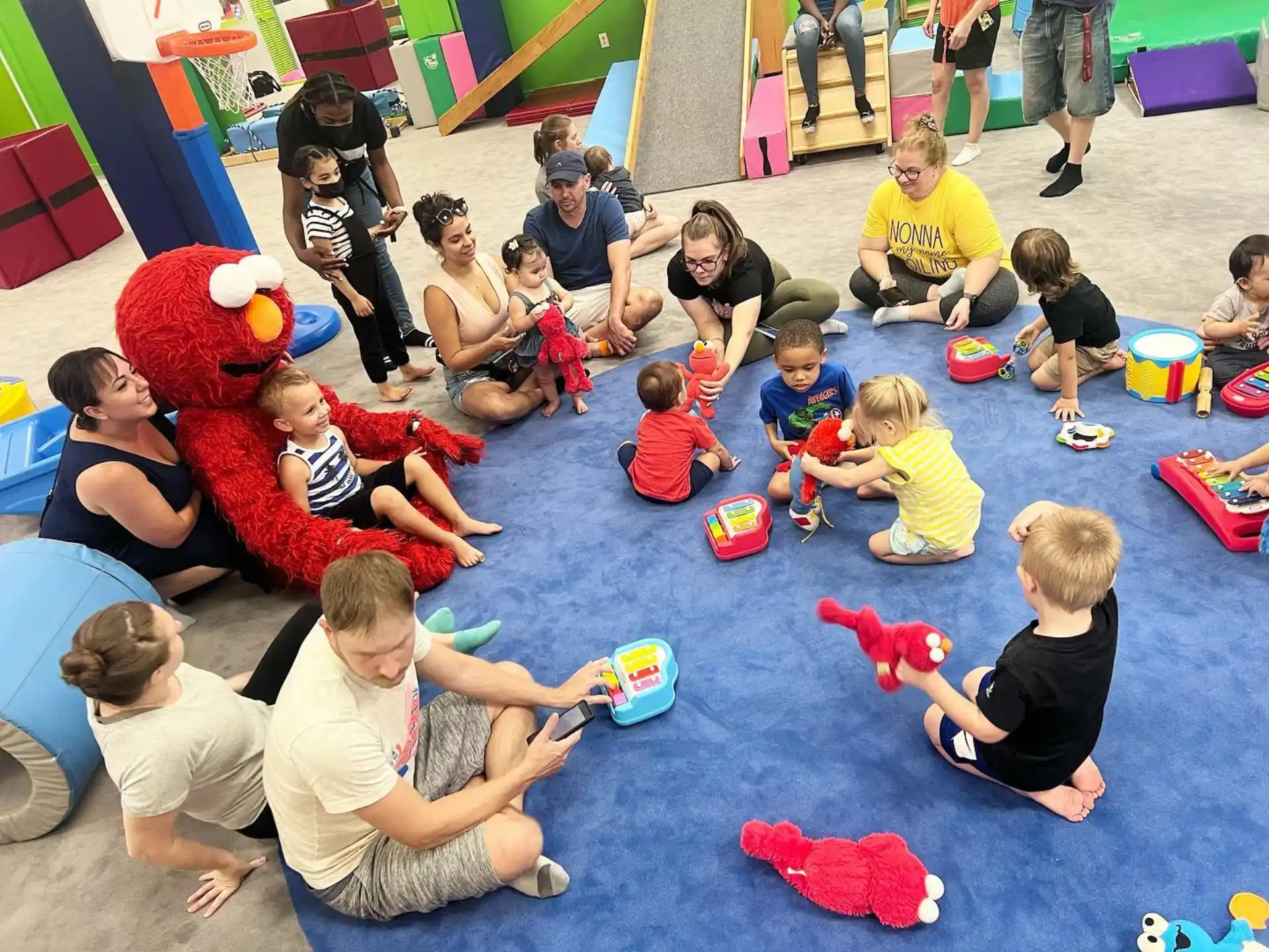a group of people sitting on the floor
