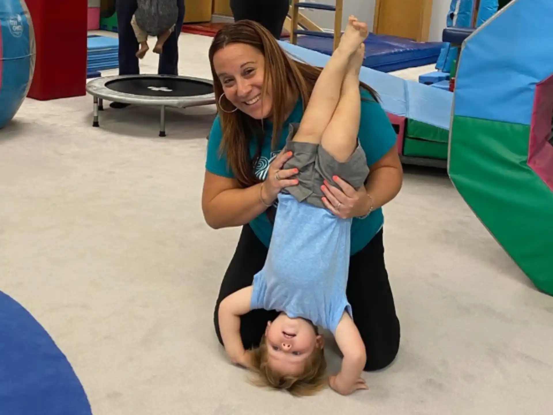 a person holding a child