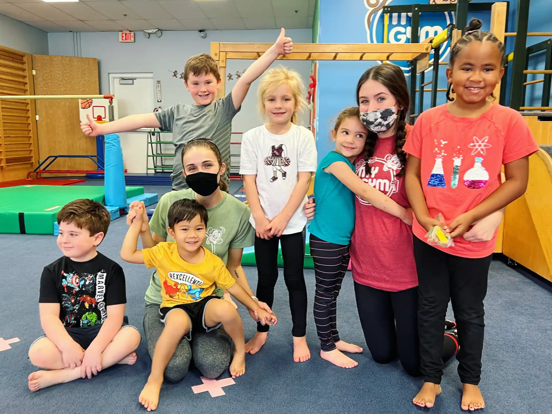 a group of children posing for a photo