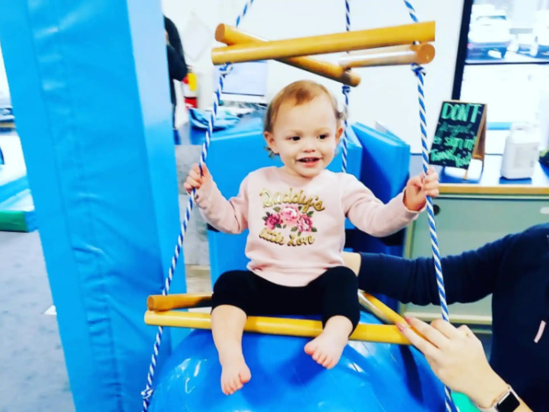 a baby on a swing