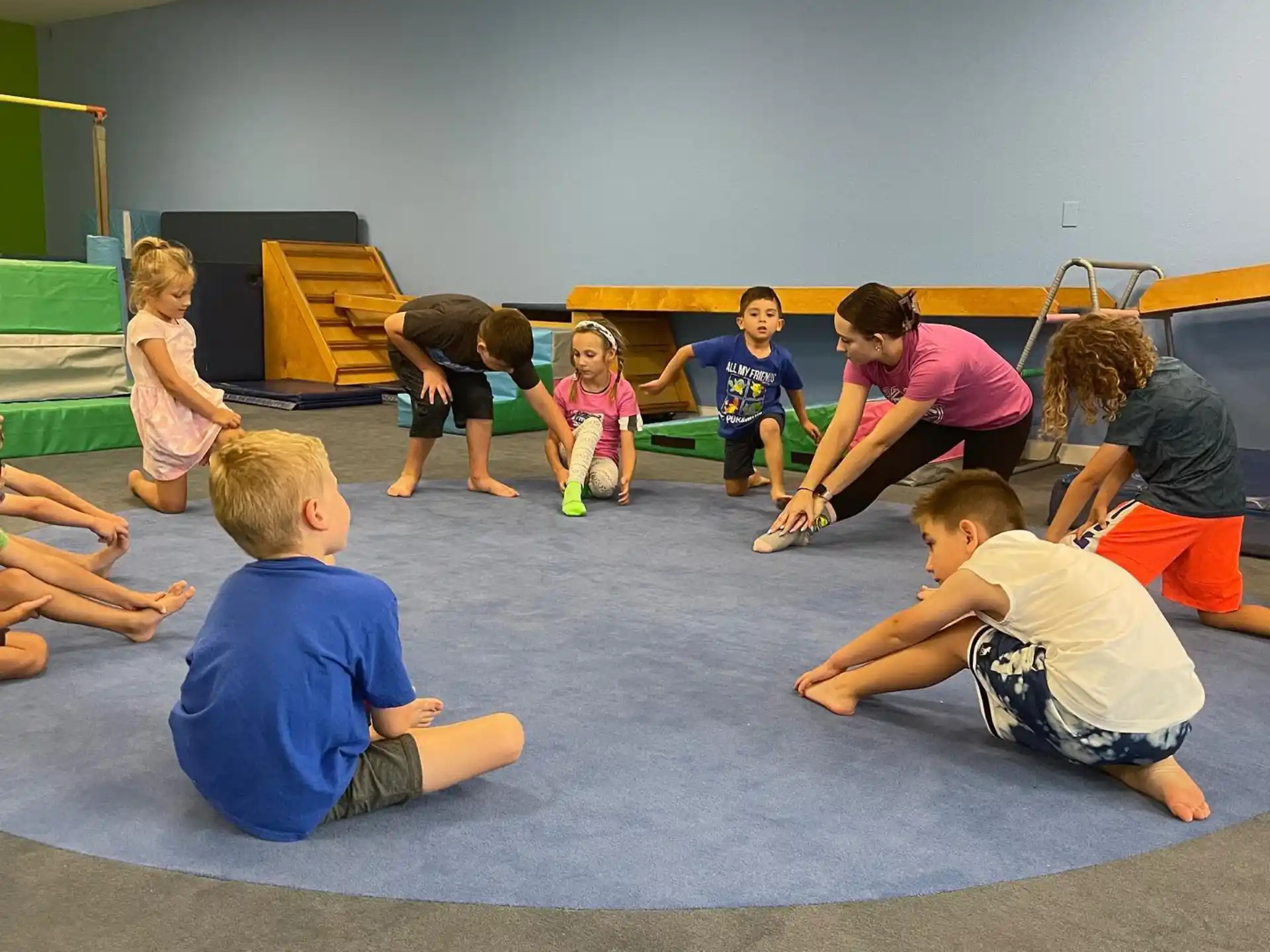a group of children sitting on the floor
