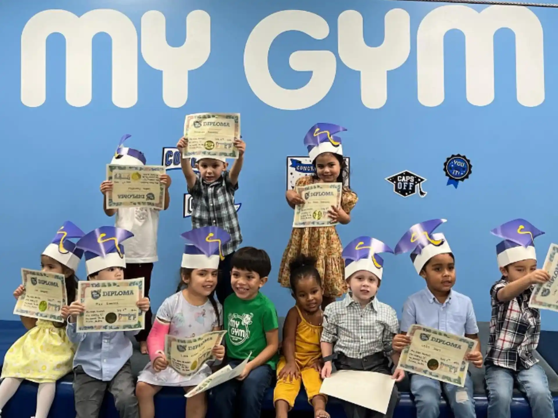 a group of children holding signs