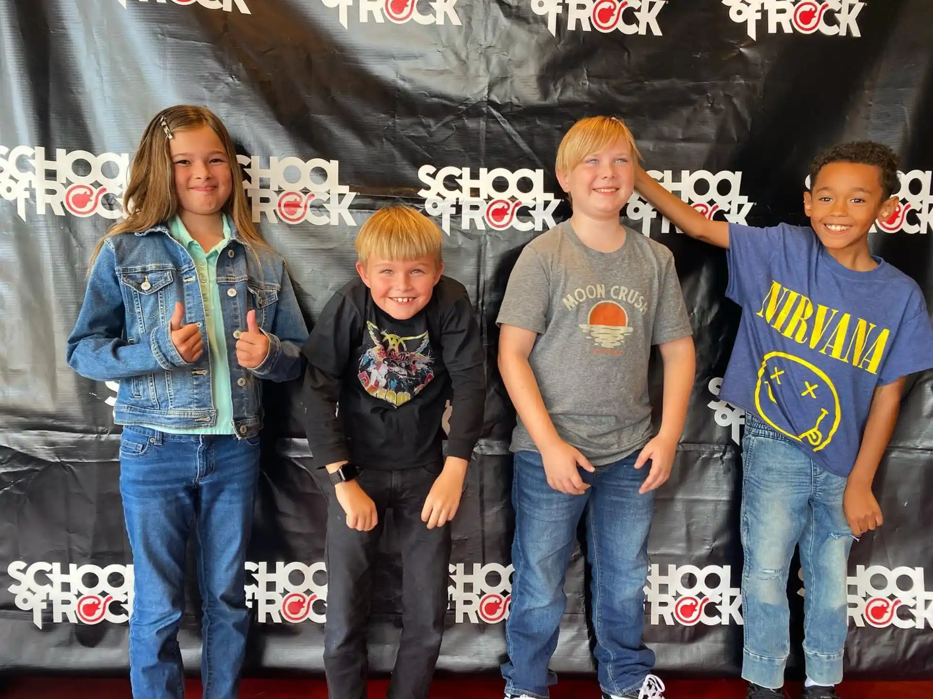 a group of people posing for a photo
