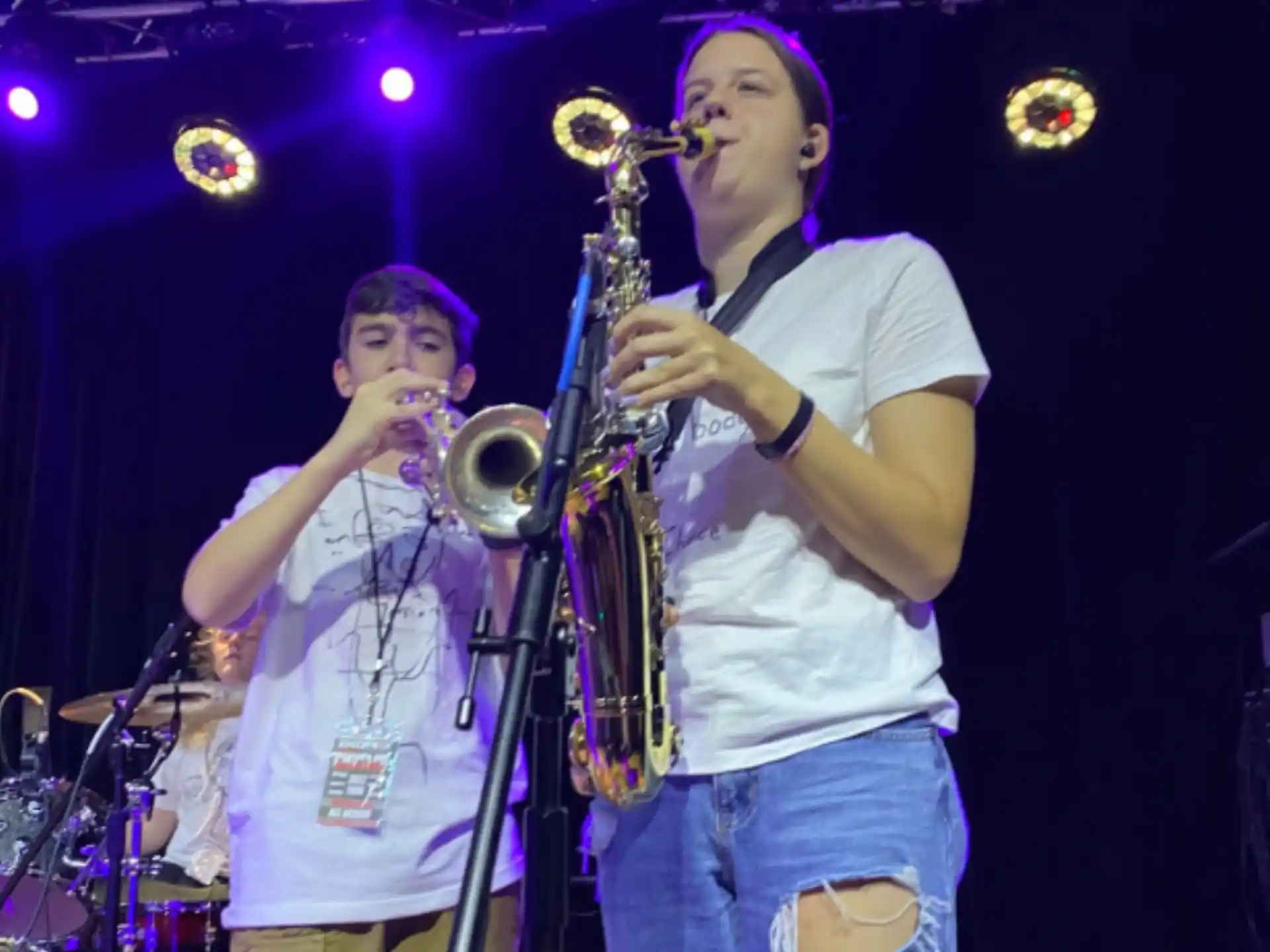 a couple of men playing instruments