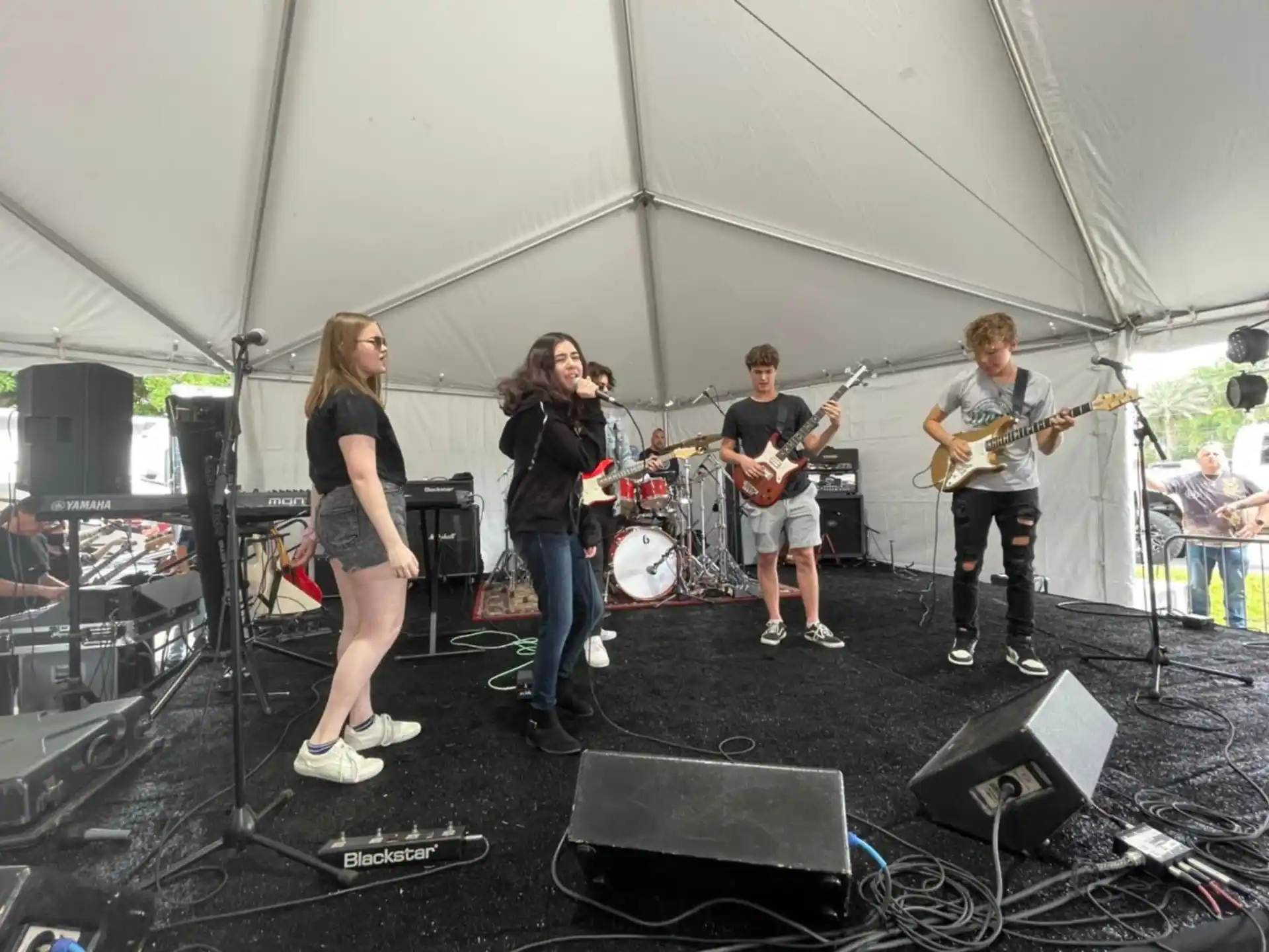 a group of people playing instruments