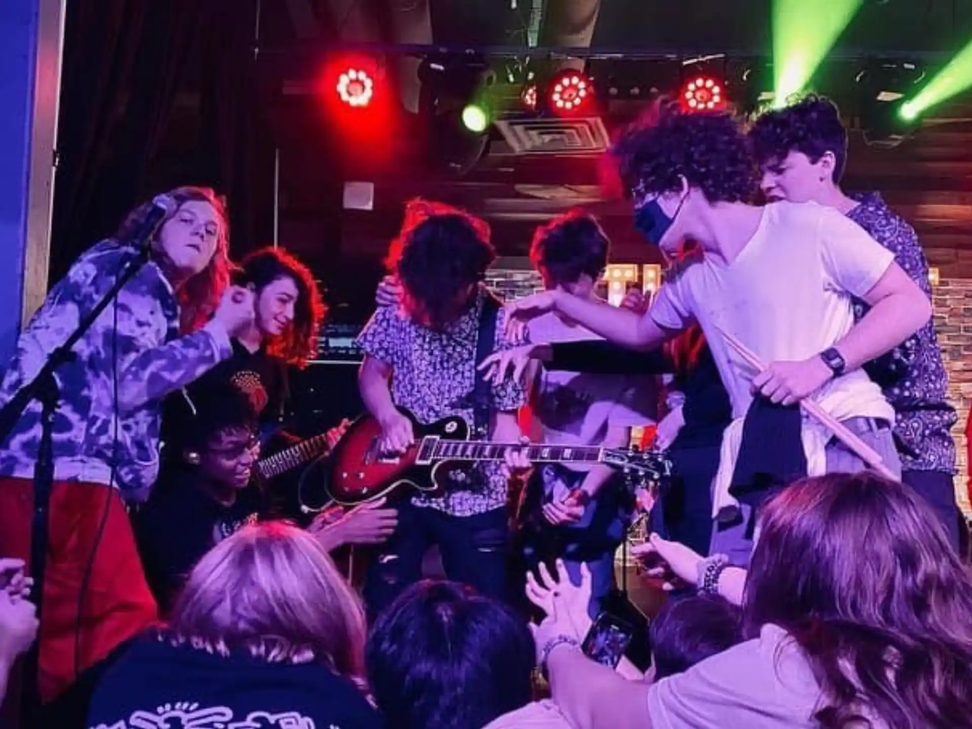 a group of people playing instruments
