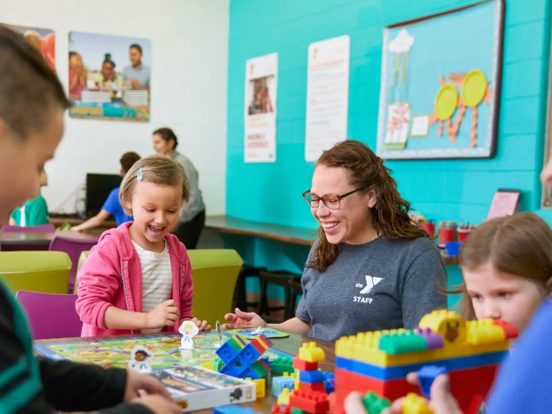 a group of children playing with toys