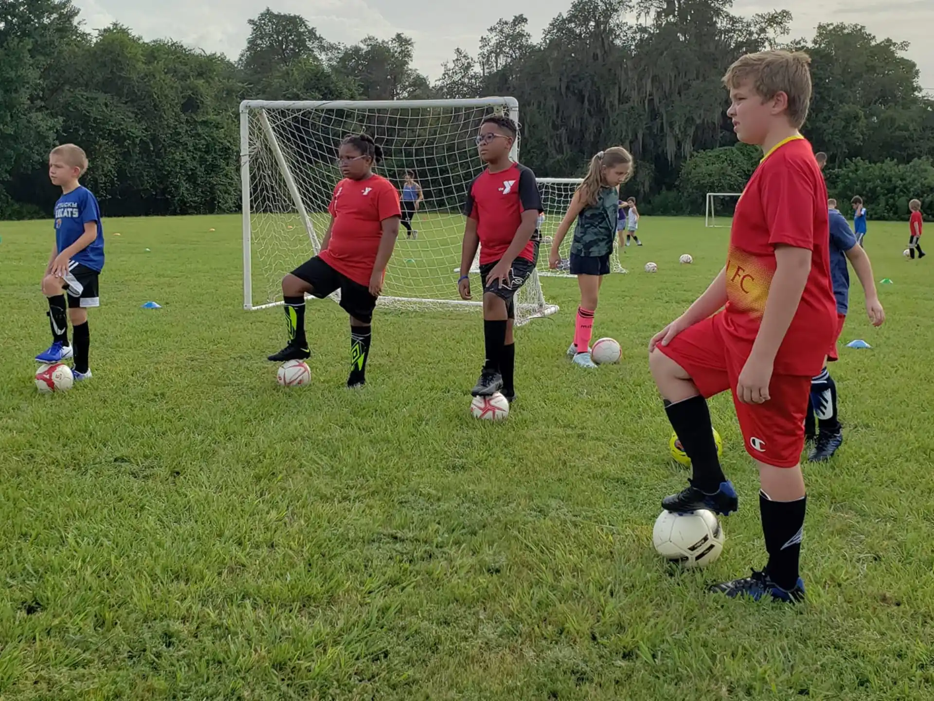 kids playing football on a field
