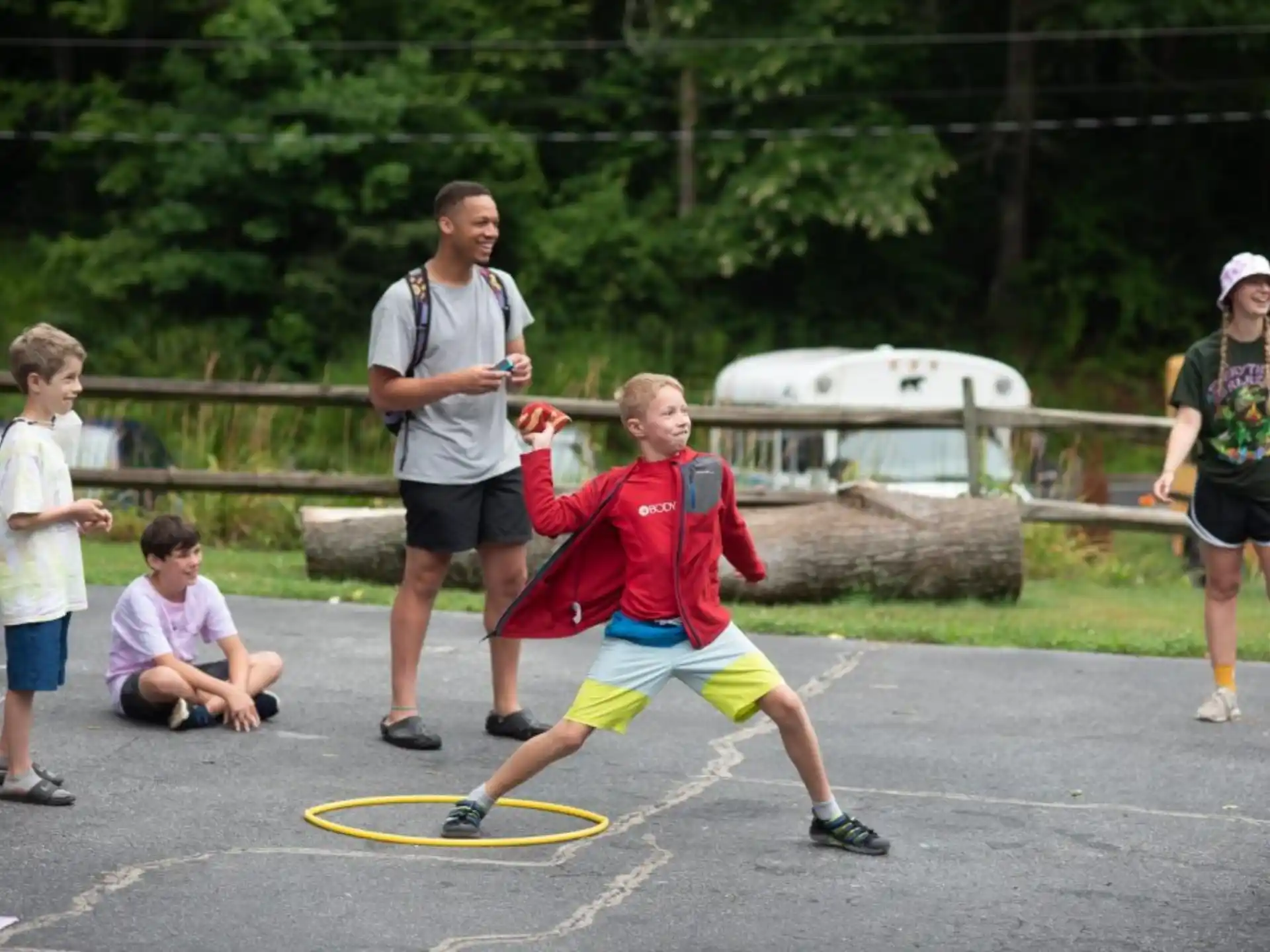a group of people playing with a rope