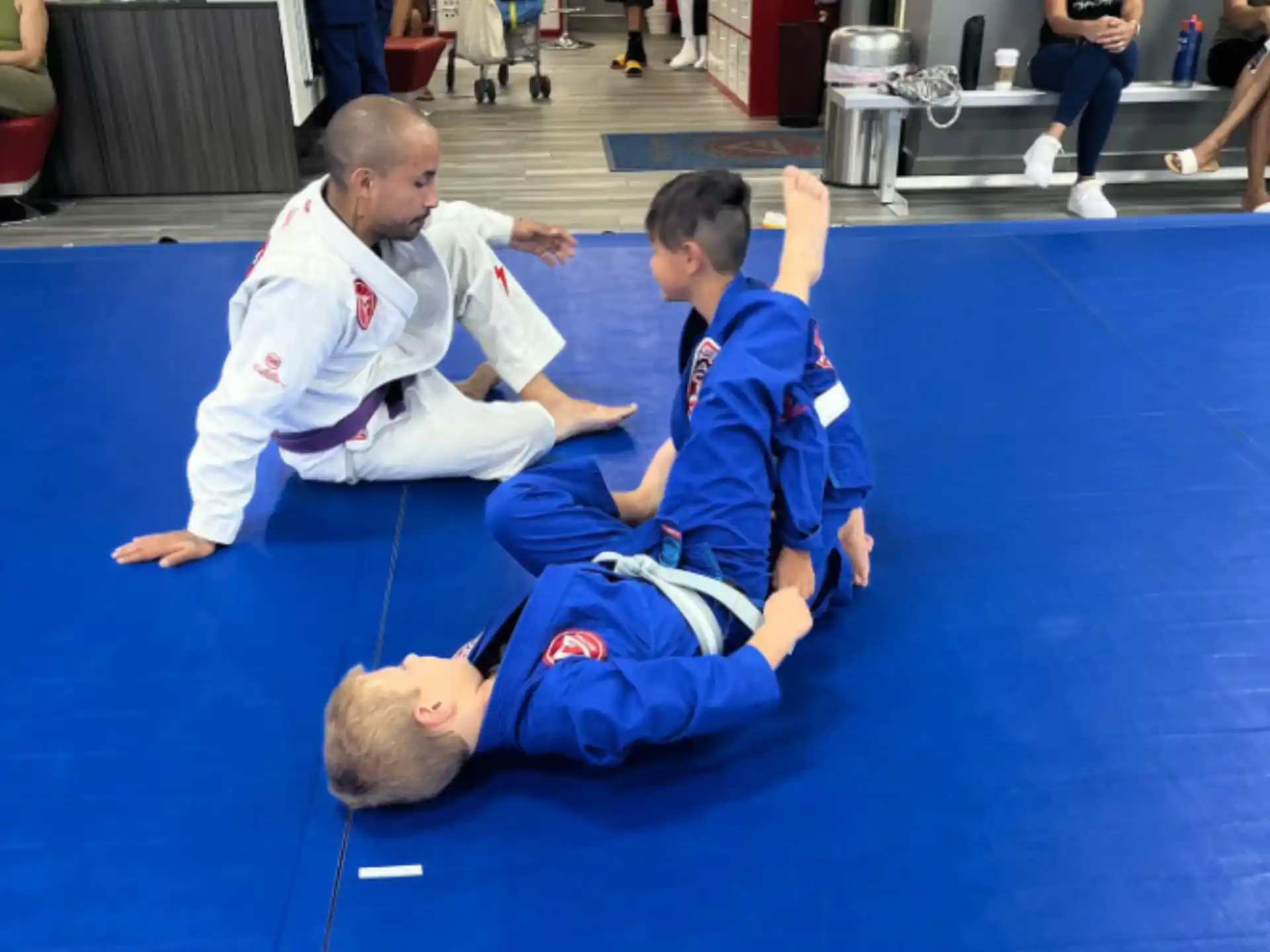 a group of people in karate uniforms
