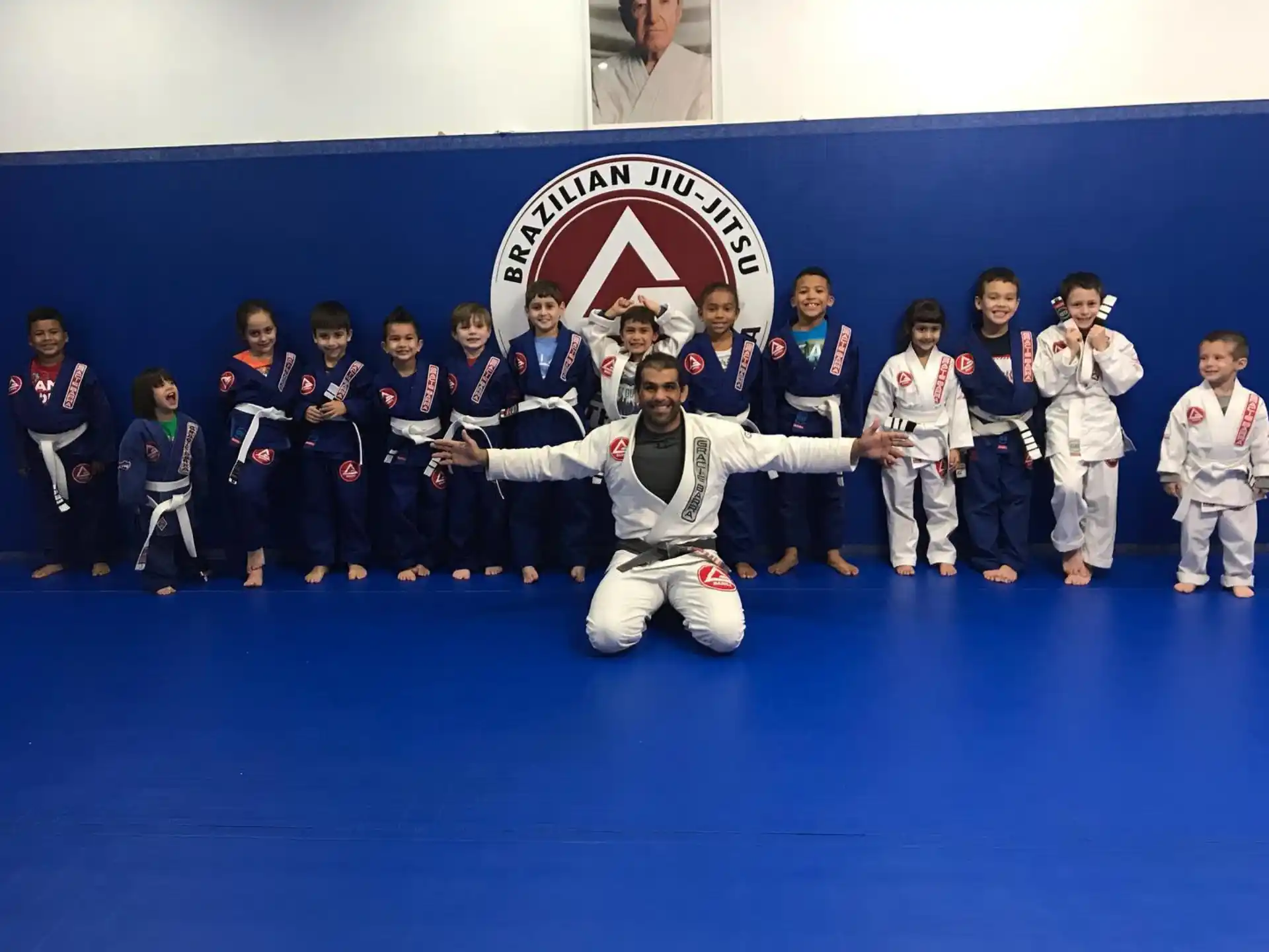 a group of people in karate uniforms
